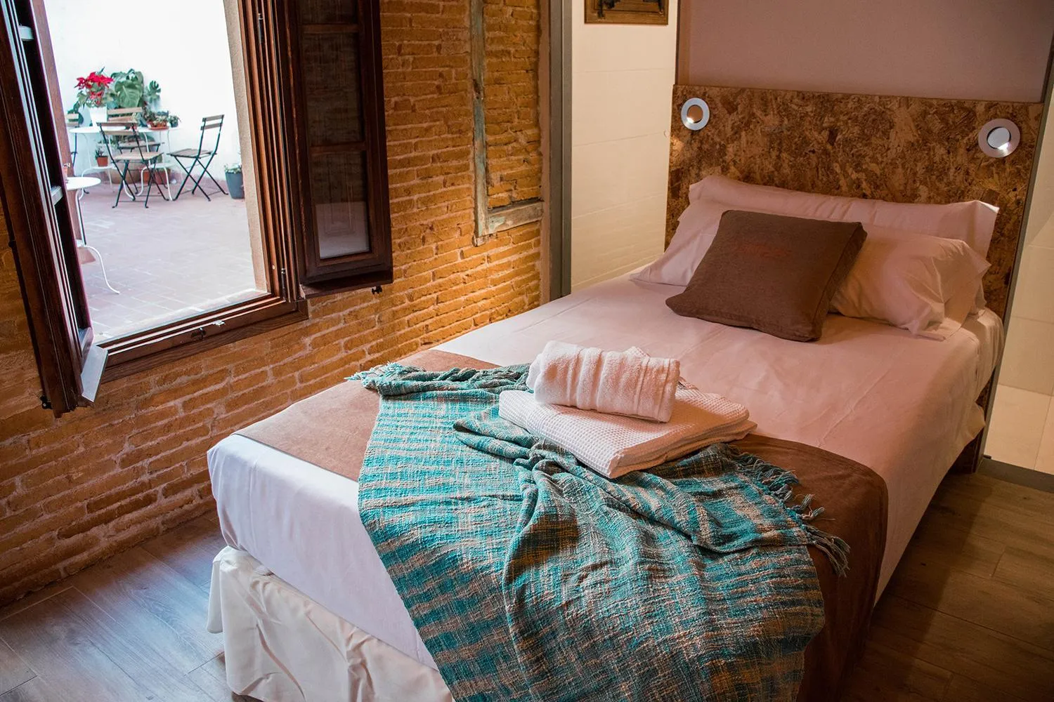 Bed in Àmfores Boutique Guest House