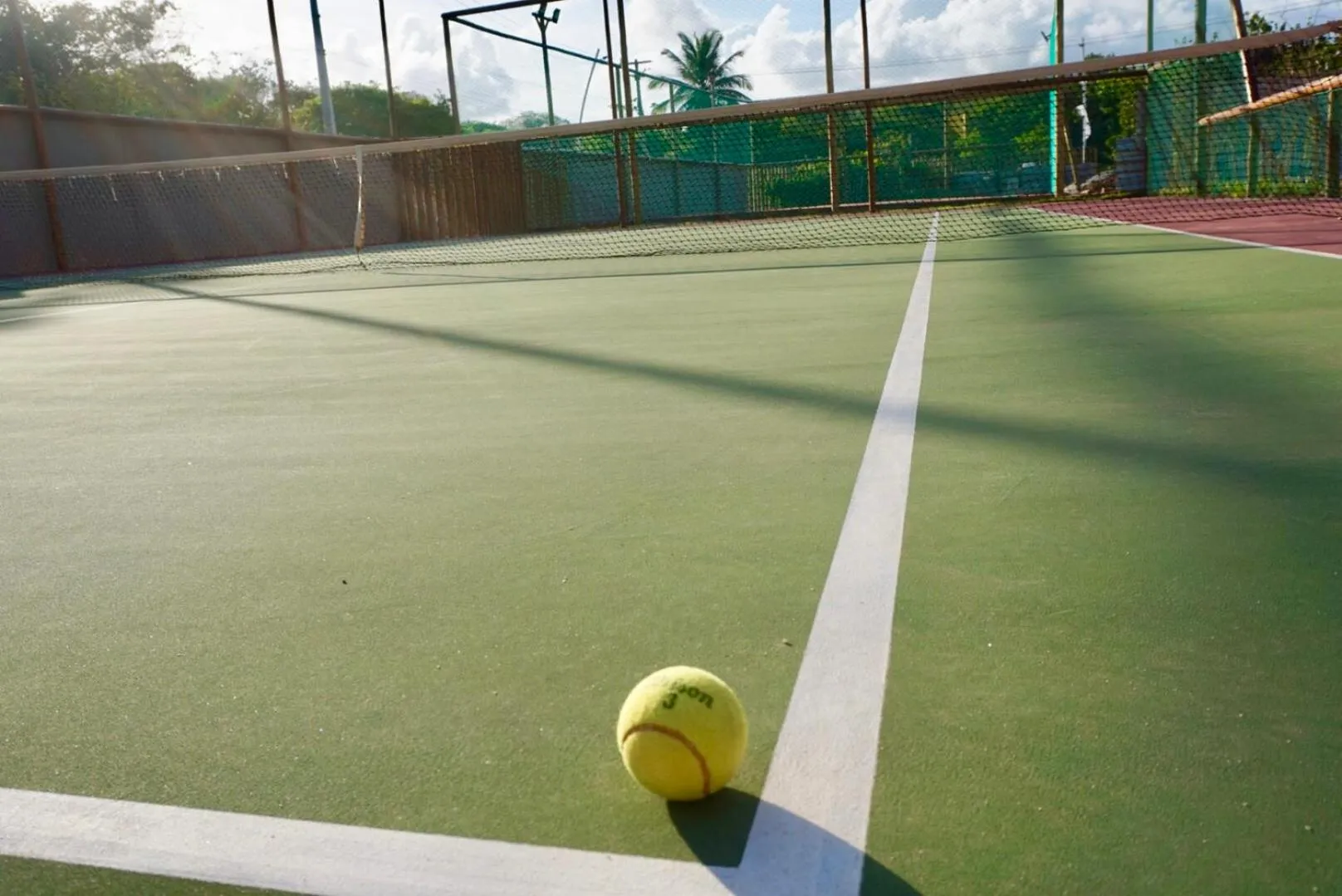Tennis court in Samoa Beach Resort
