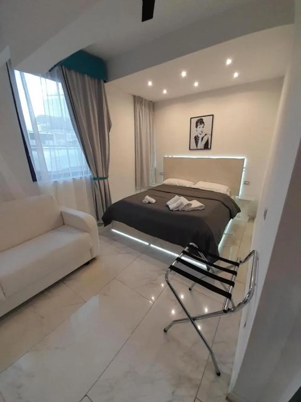 Bed in Tiffany & Babylon Luxury Stay