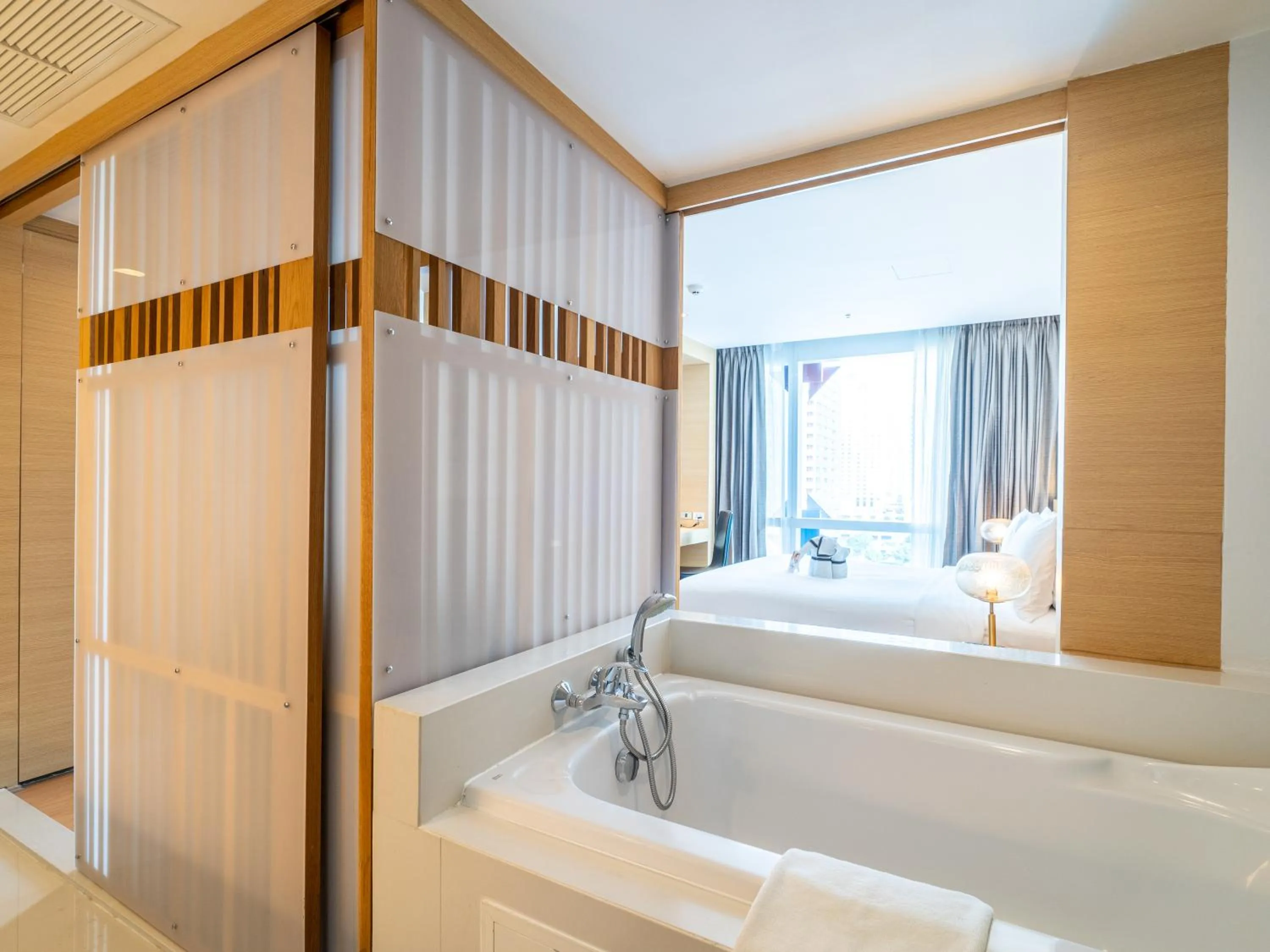 Bathroom, Bed in VELA Dhi GLOW Pratunam