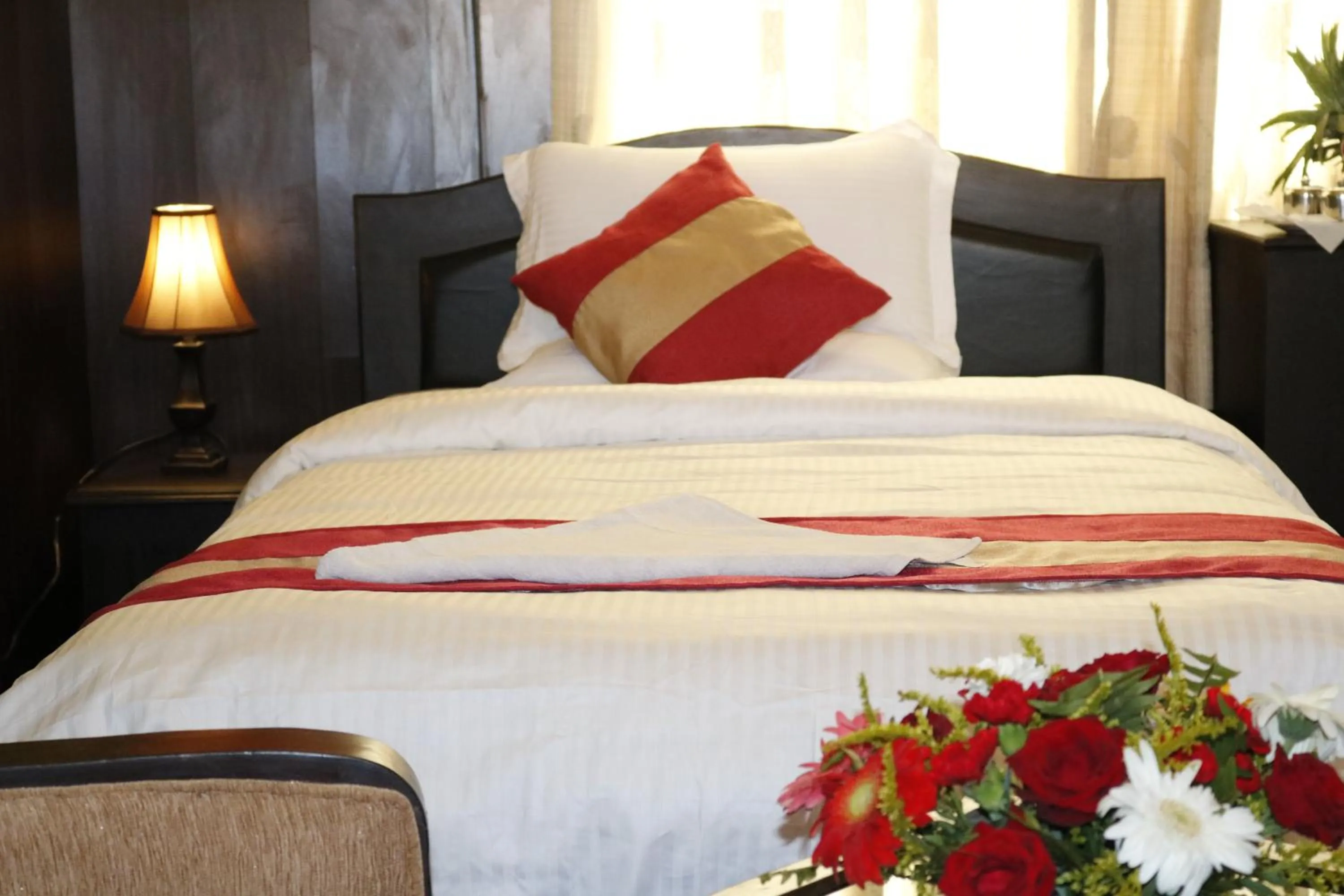 Bed in Hotel Nepalaya