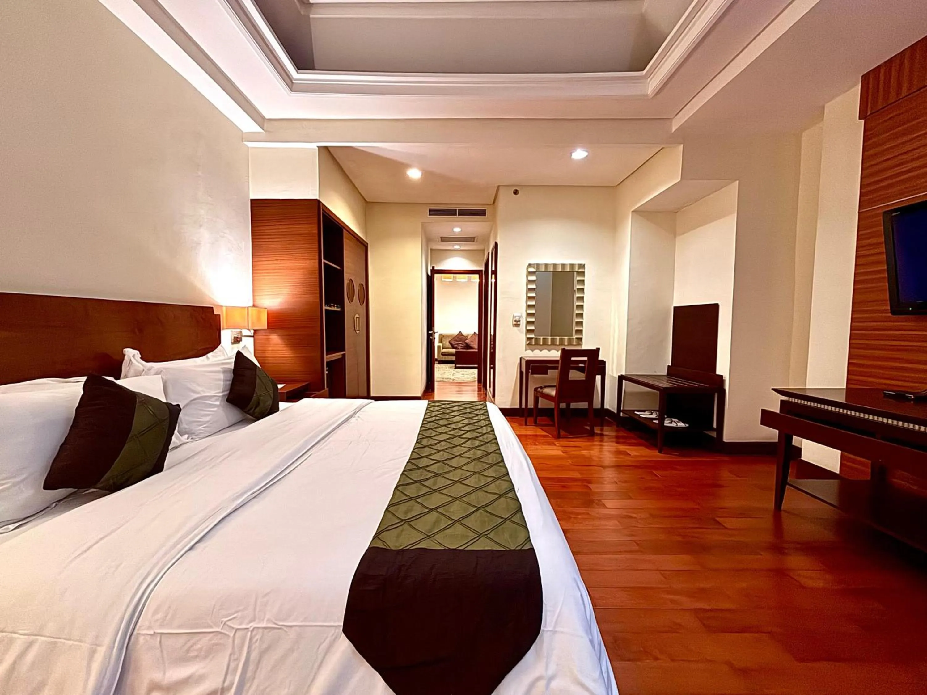 Living room, Bed in Manado Quality Hotel