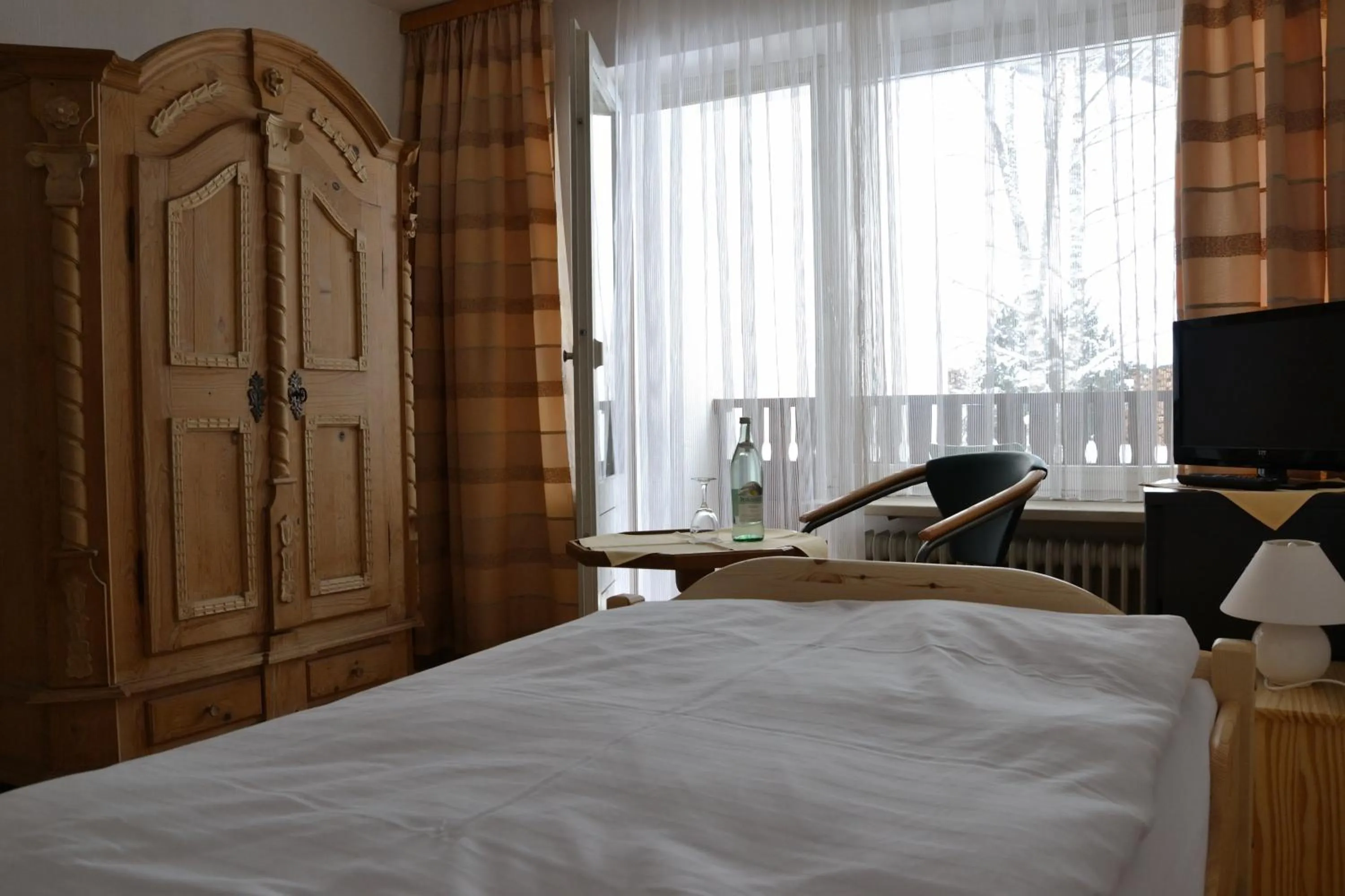 Bed in Alpenhotel Beslhof