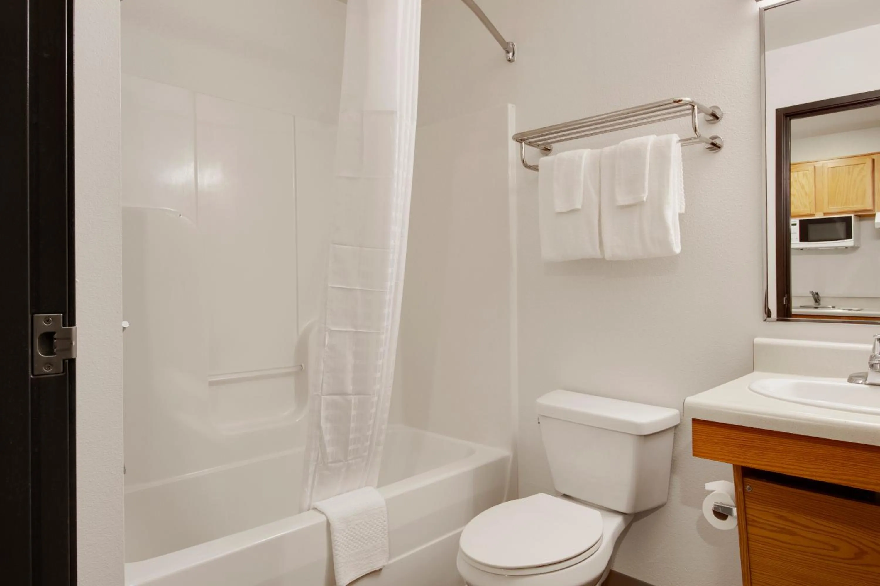 Bathroom in WoodSpring Suites Houston Baytown