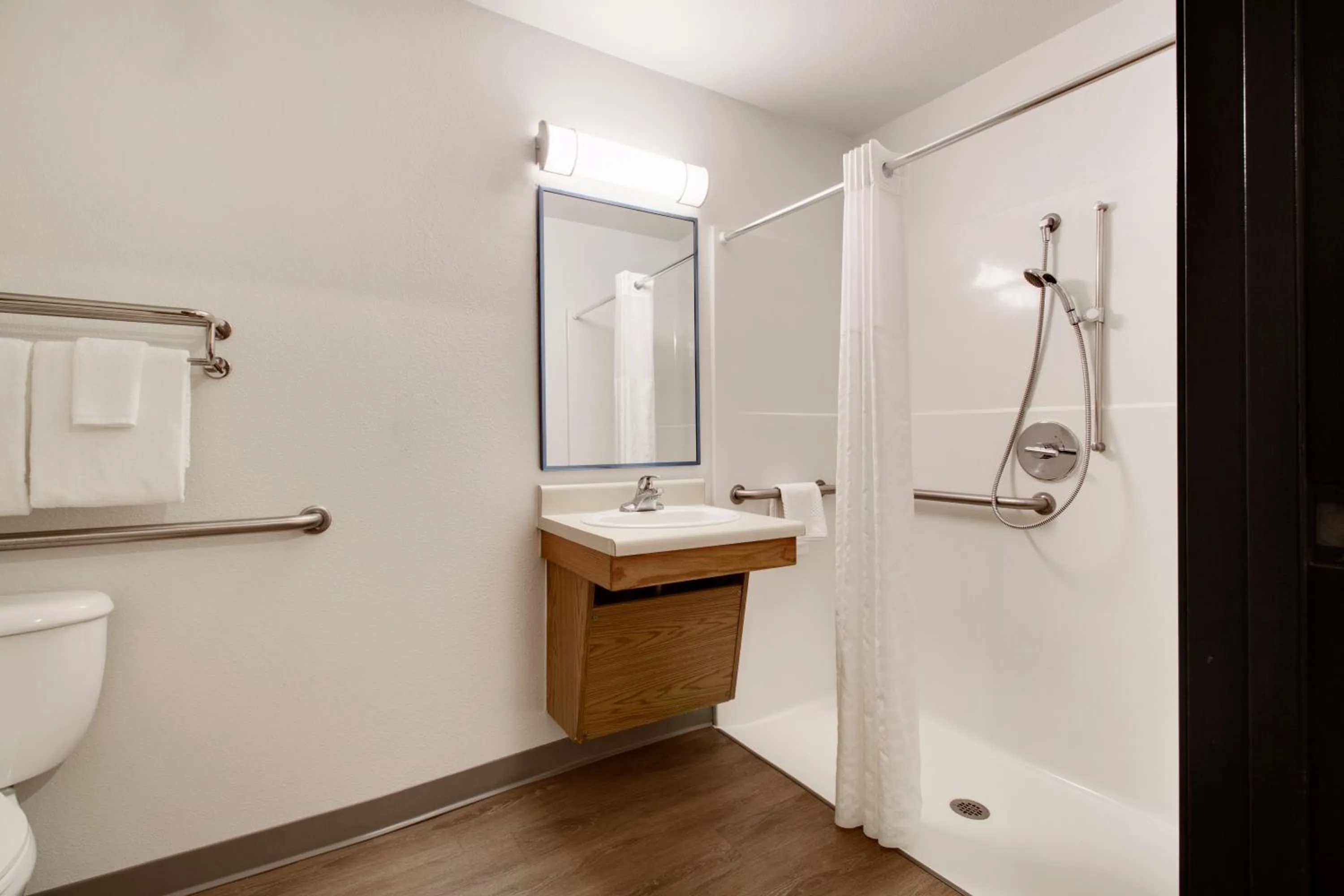 Bathroom in WoodSpring Suites Houston Baytown