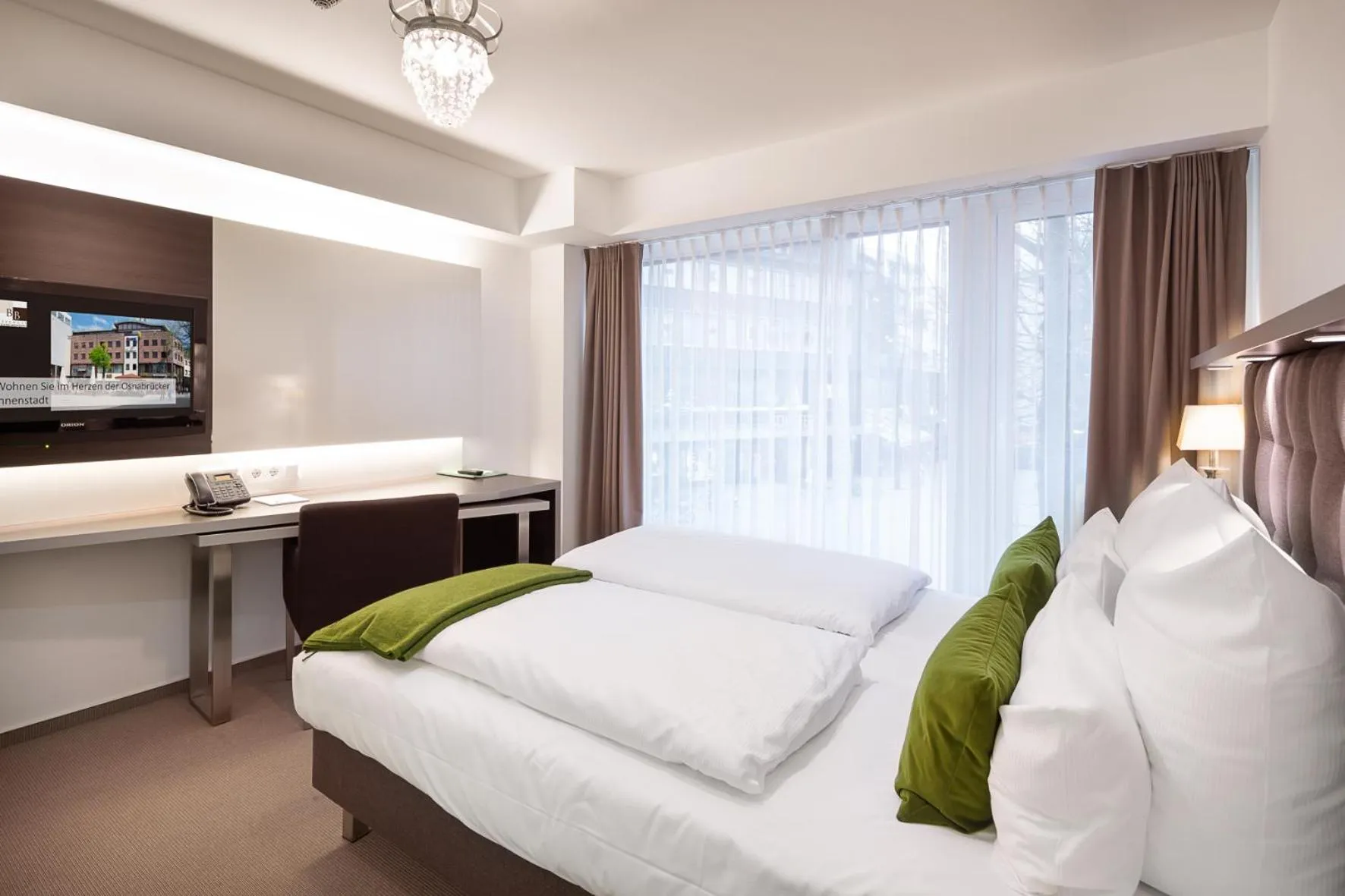 Photo of the whole room, Bed in Bergmann Boardinghouse Osnabrück