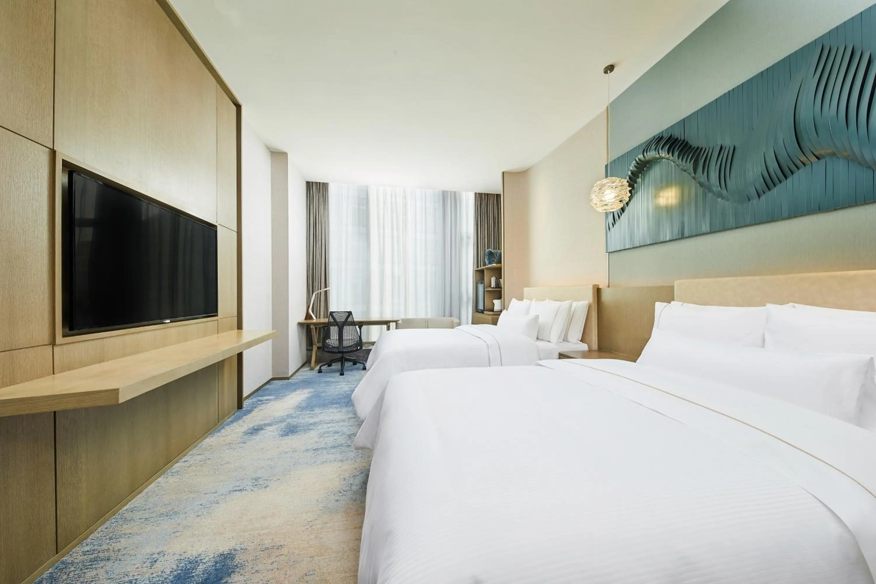 Photo of the whole room, Bed in The Westin Qingdao West Coast