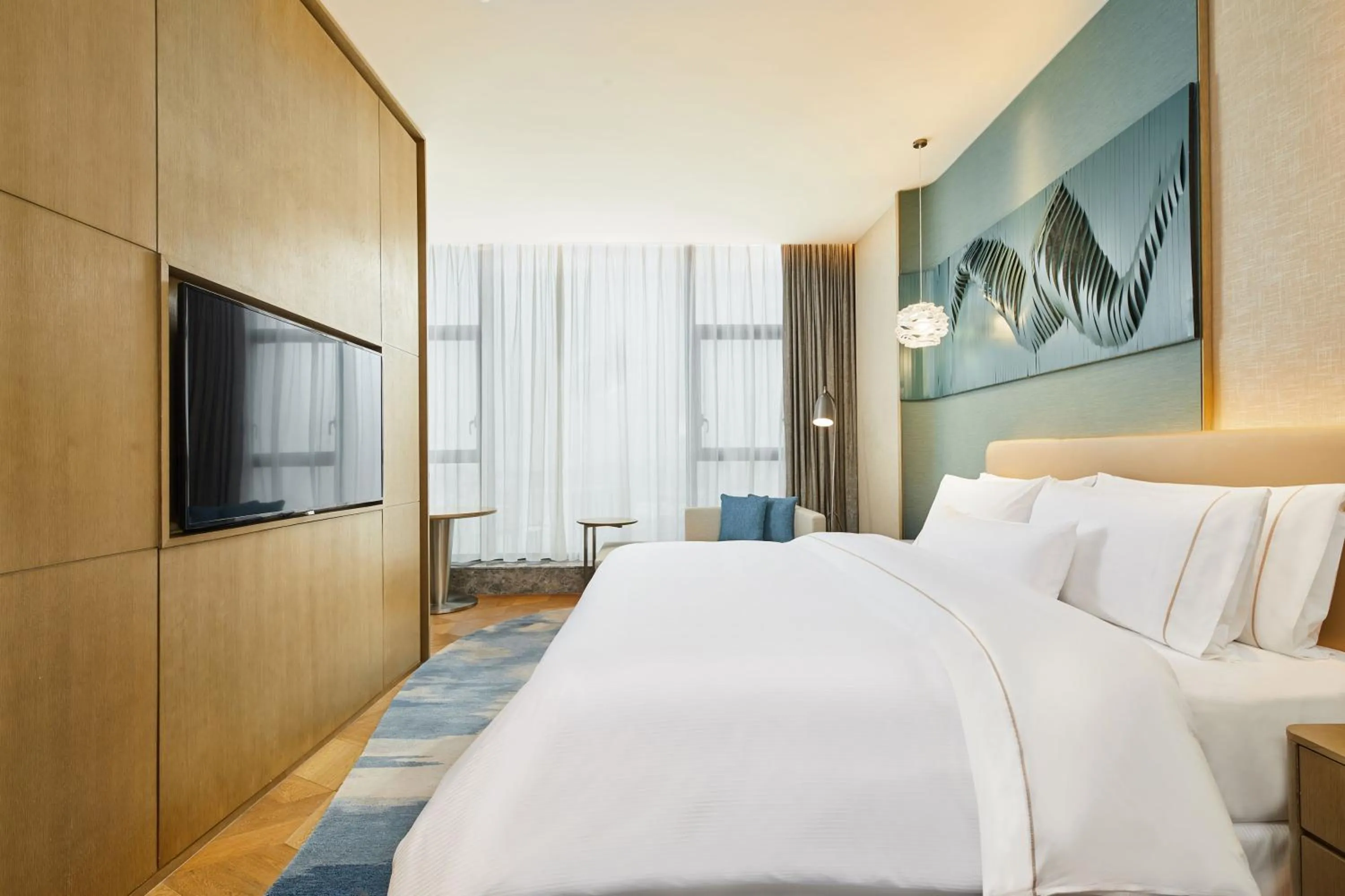 Bed in The Westin Qingdao West Coast