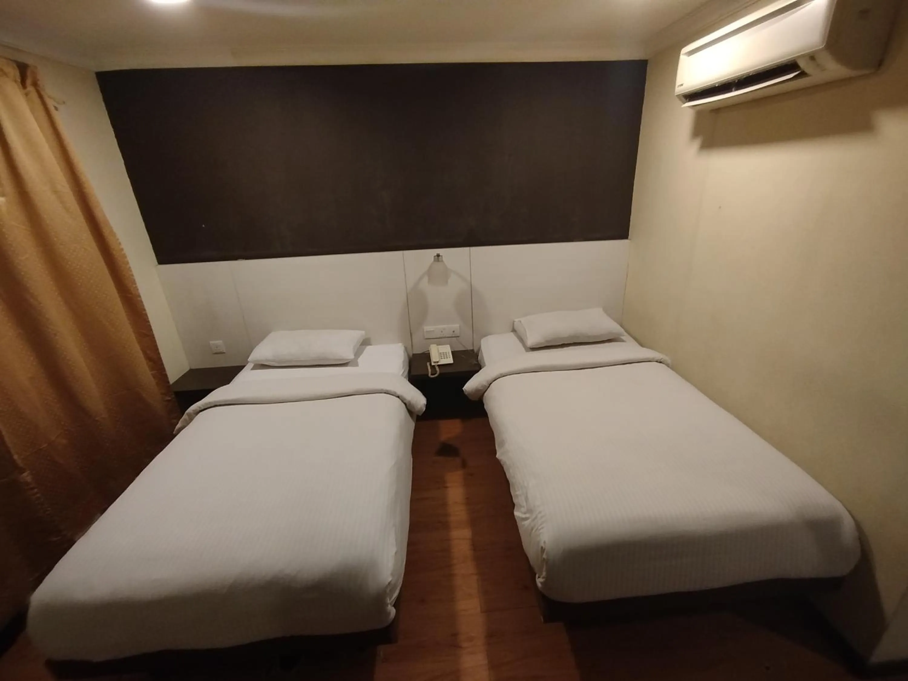 Bed in Hotel De Grand Orchard