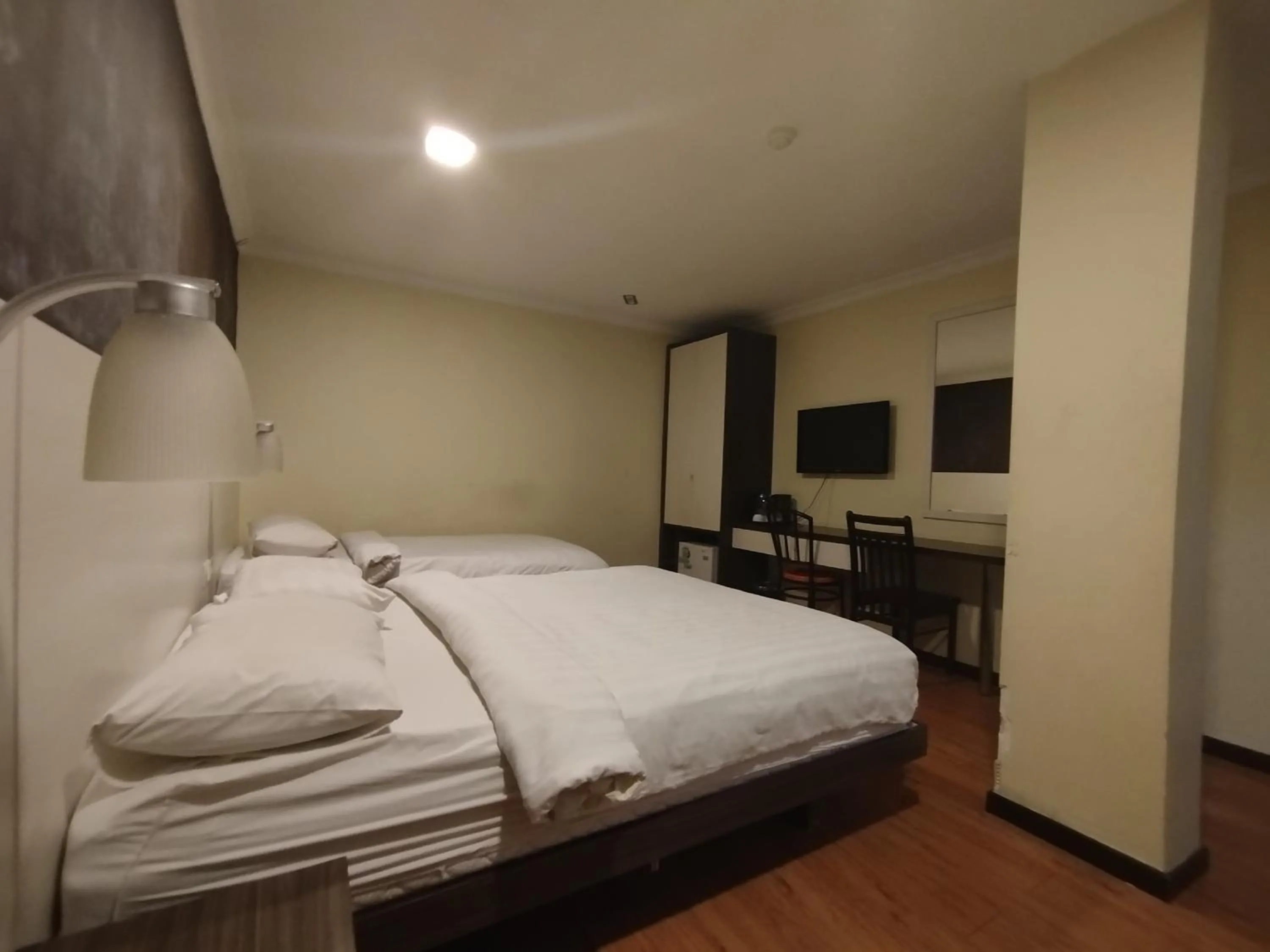 Bed in Hotel De Grand Orchard