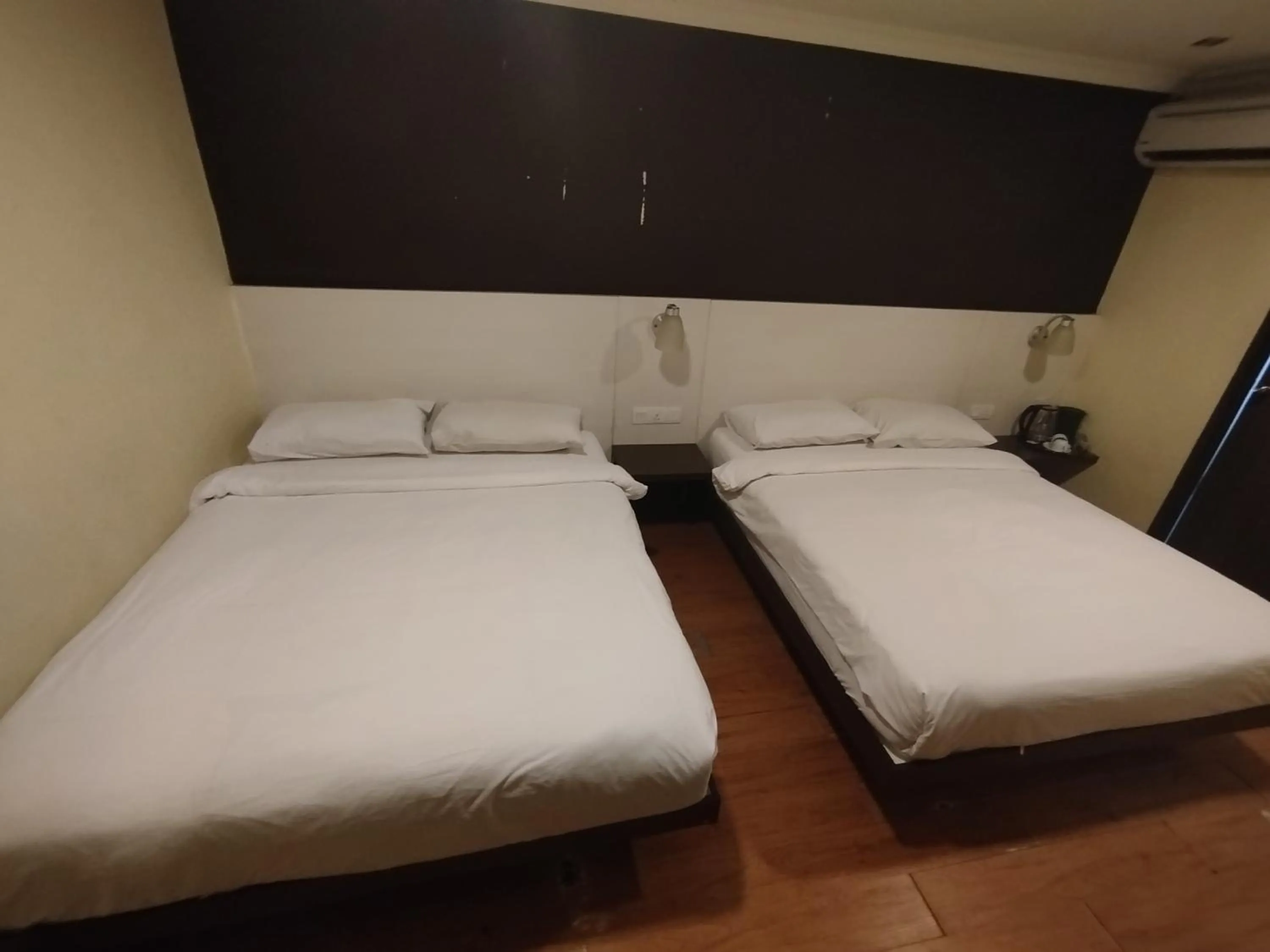Bed in Hotel De Grand Orchard