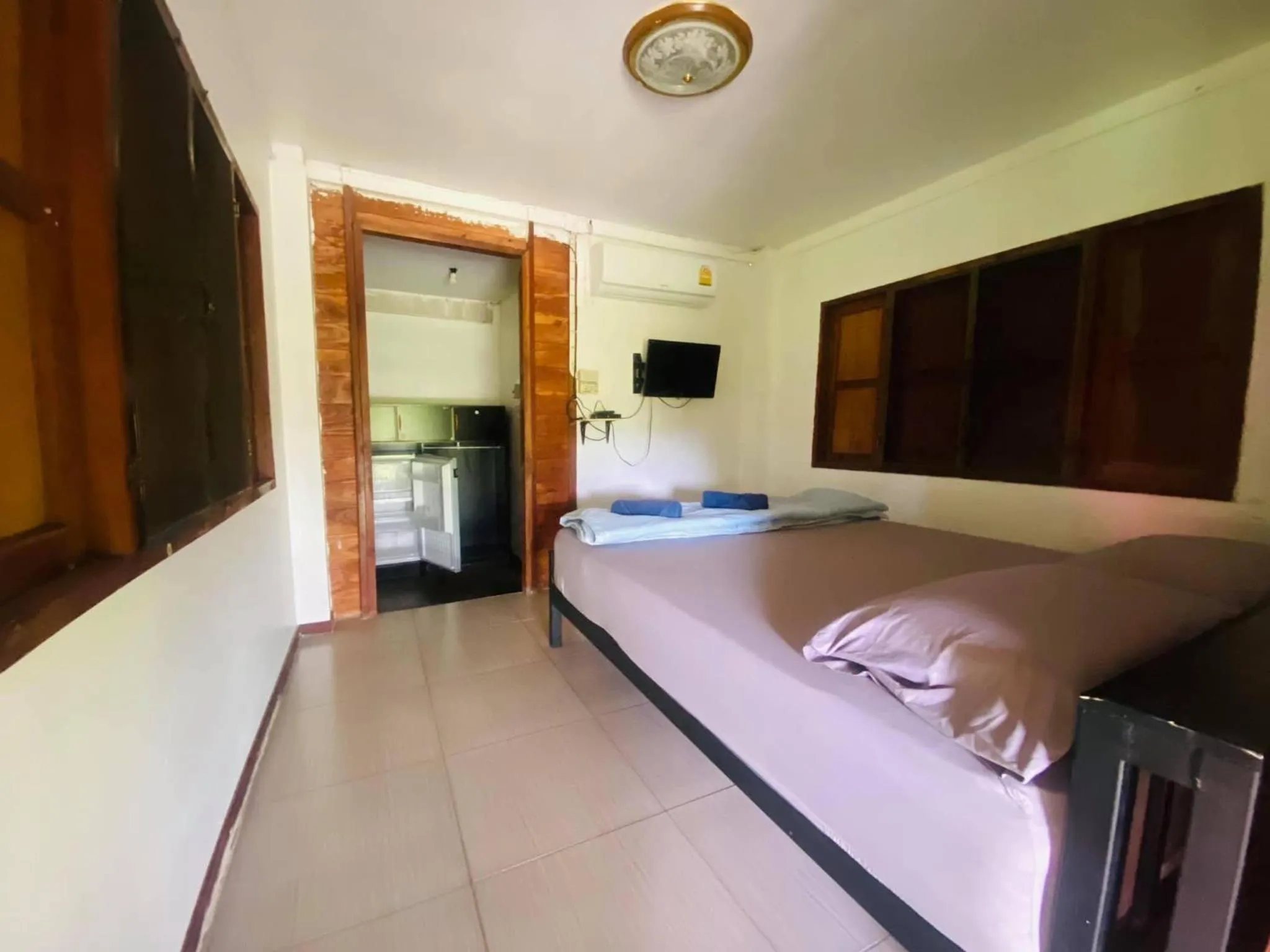 Bed in Moon River Resort Phimai