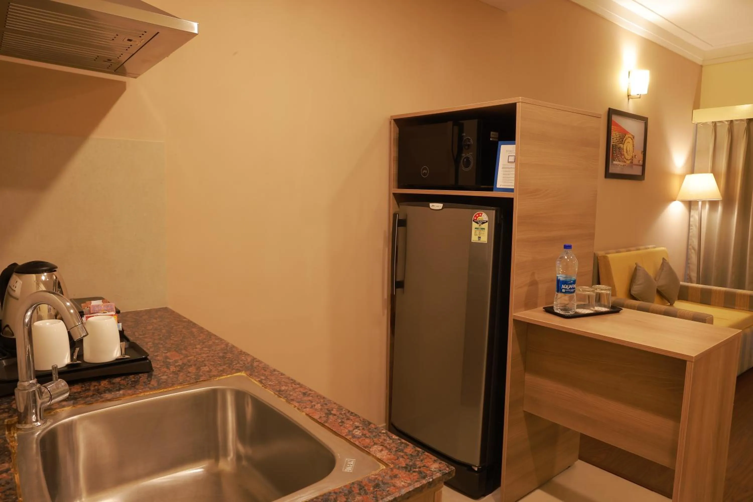 Kitchen or kitchenette in Starlit Suites Tirupati
