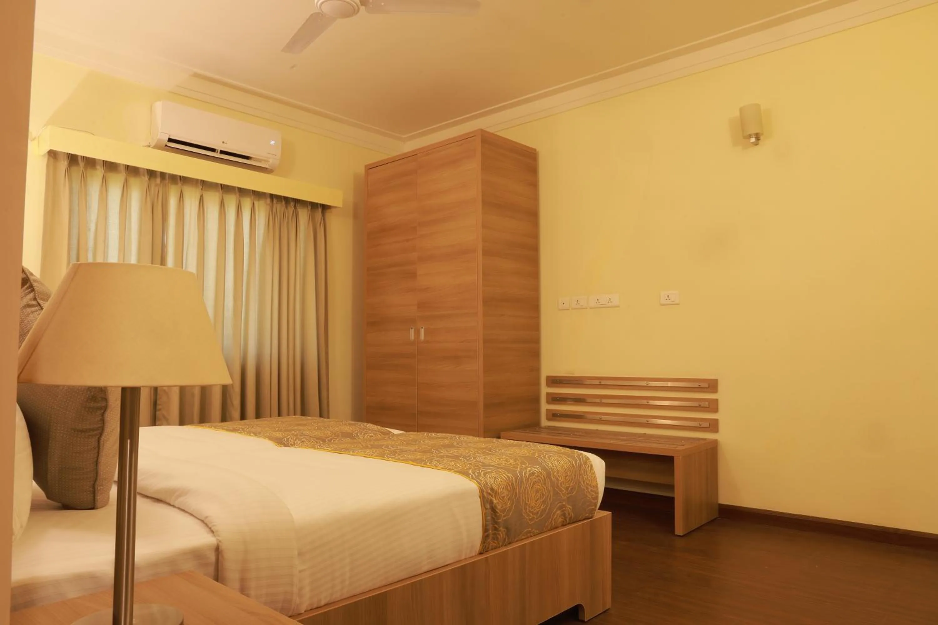 Bedroom, Bed in Starlit Suites Tirupati