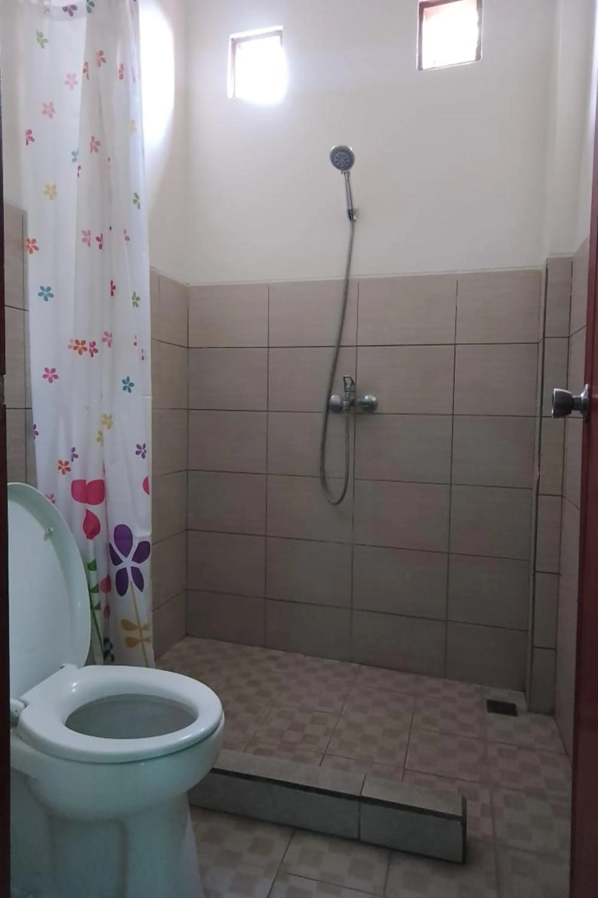 Shower, Bathroom in Downtown Monkey Forest Hostel