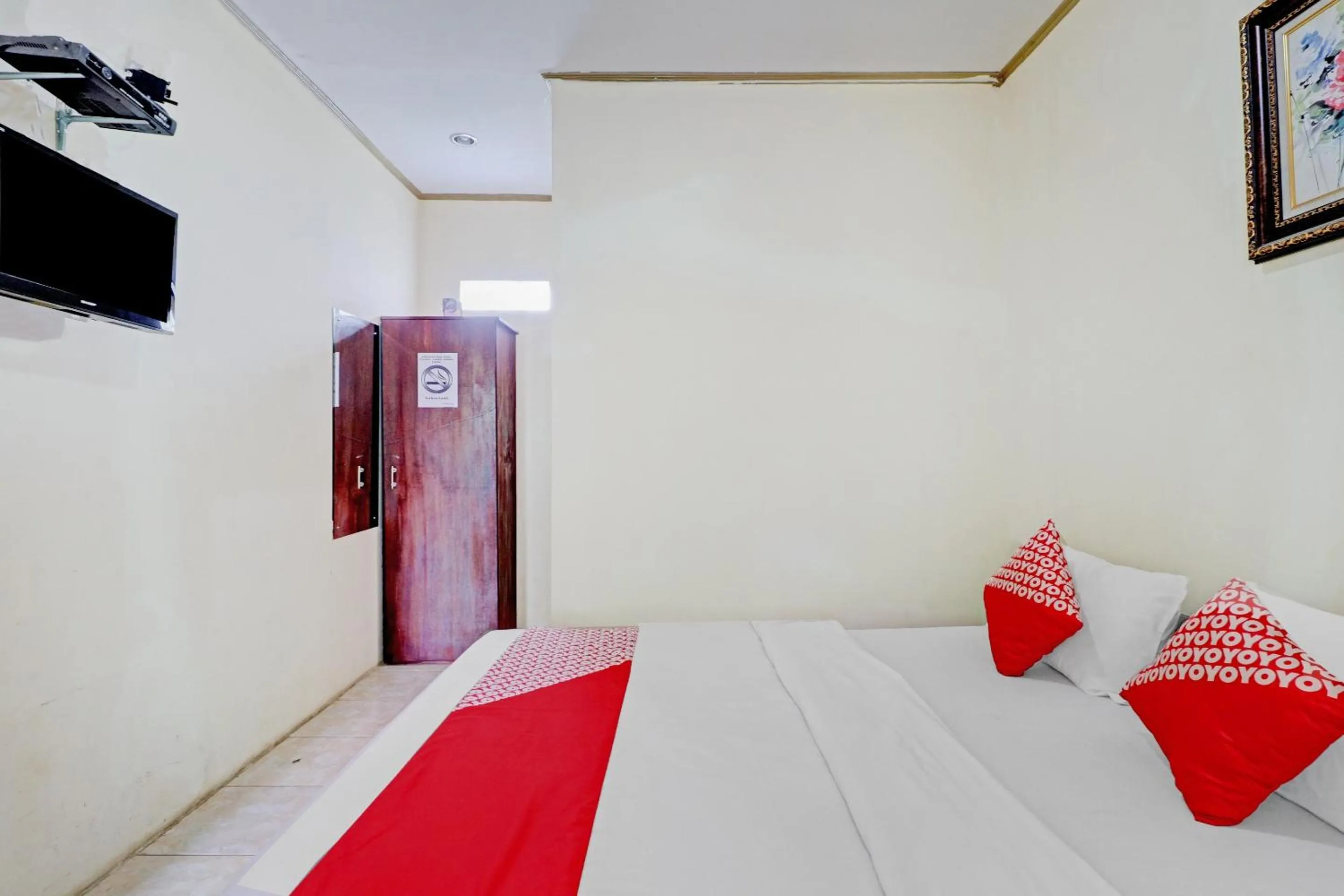 Bedroom in Collection O 90461 Graha Atmadja Syariah Guest House