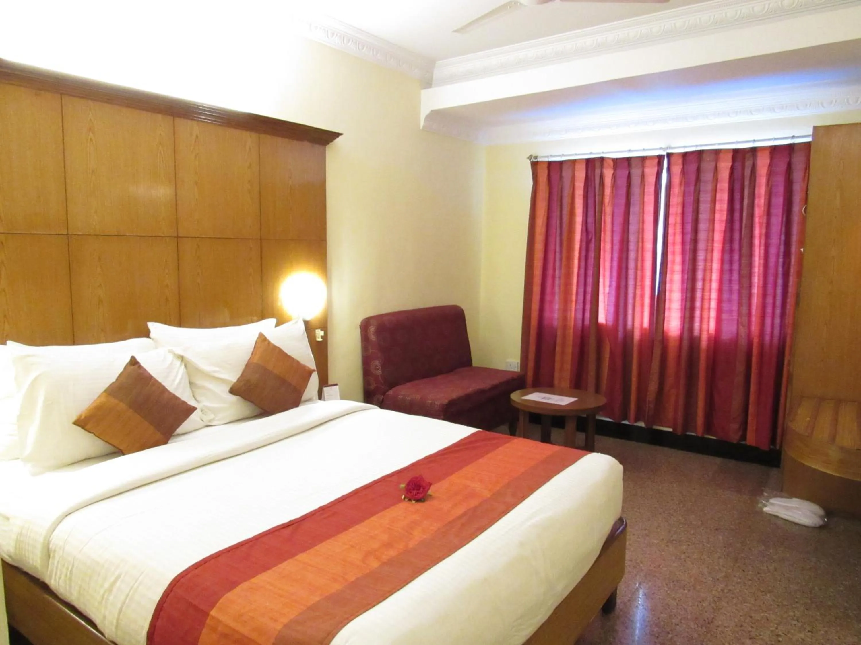 Bed in Ramanashree California Resort