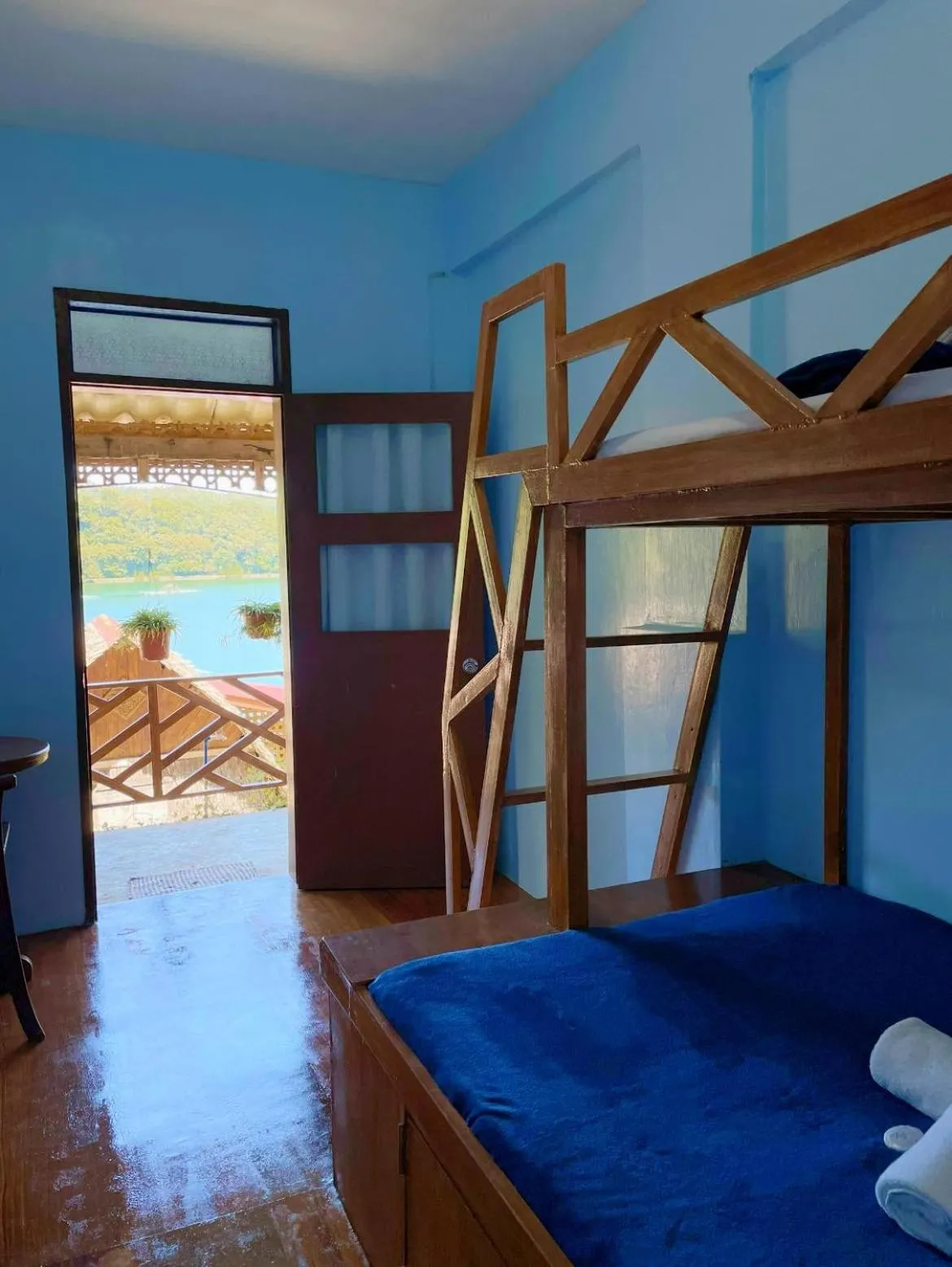 Bed in Camiguin Blue Lagoon Cottages