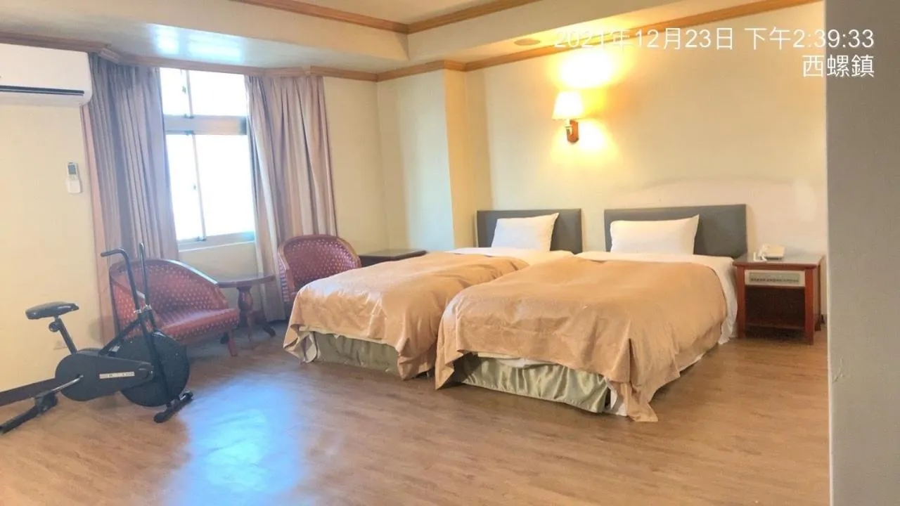 Bed in San Ho Business Hotel