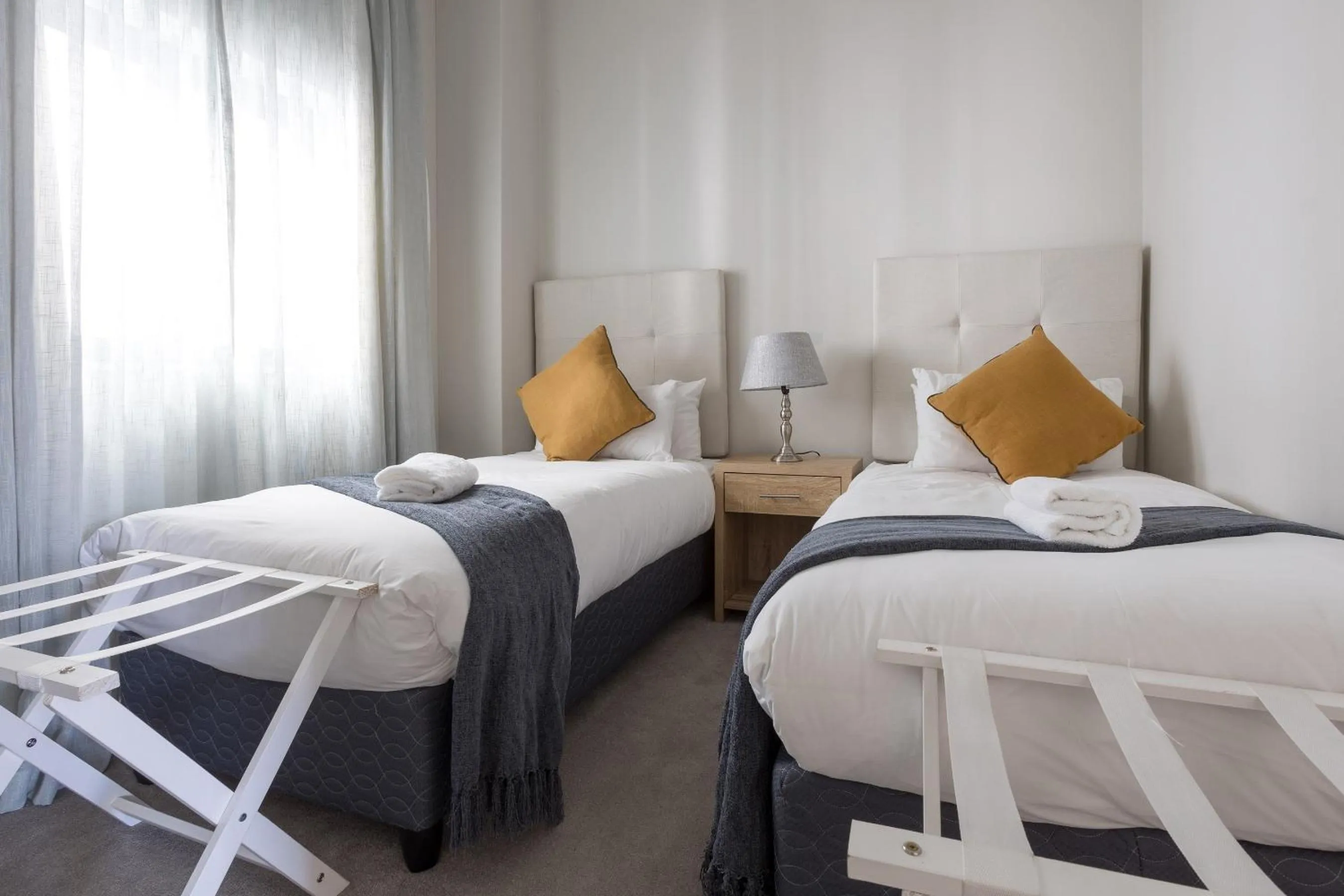 Bedroom, Bed in Axis Luxury Apartments by Century City Hotels