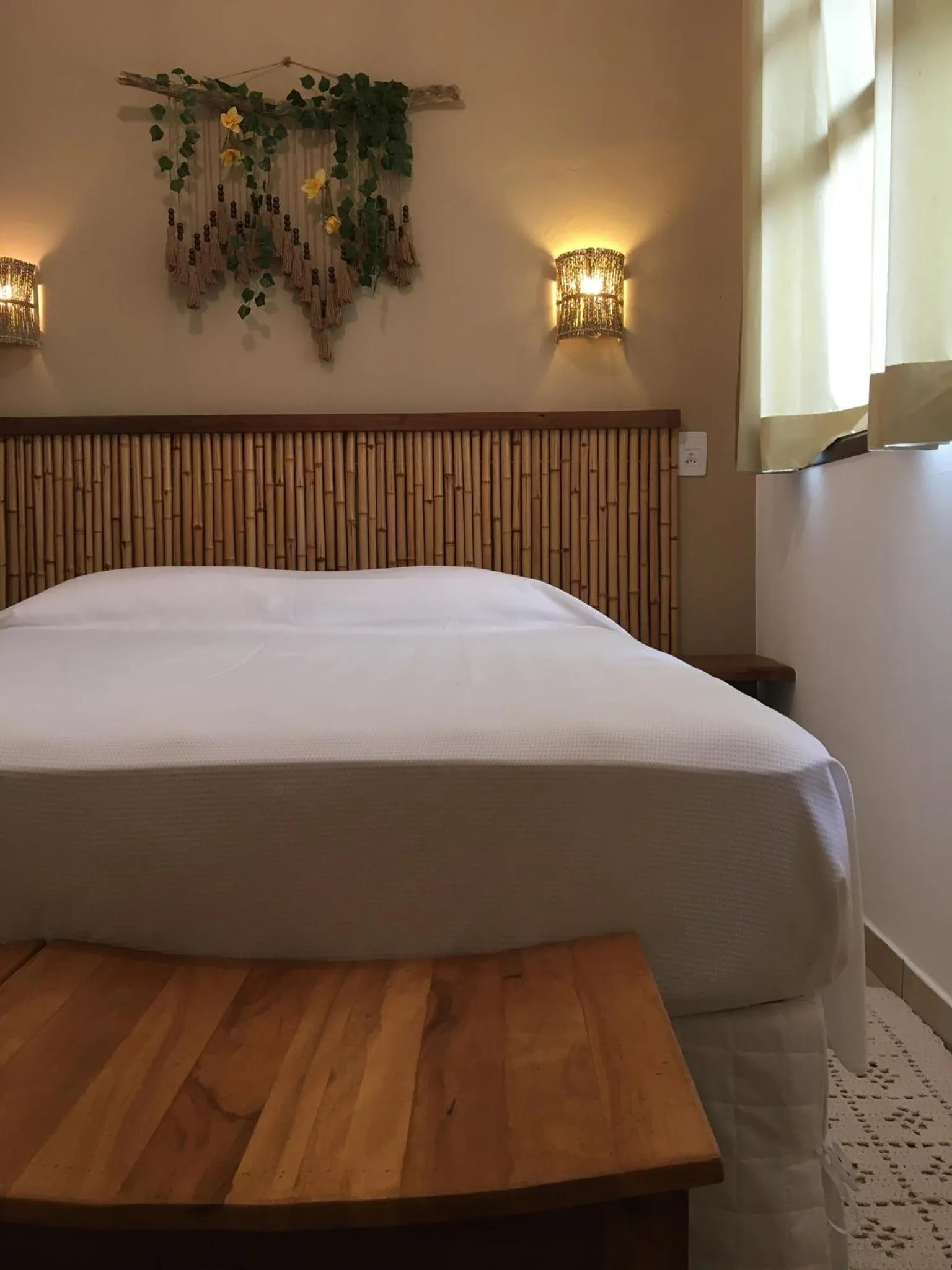 Bed in Pousada Aroeira