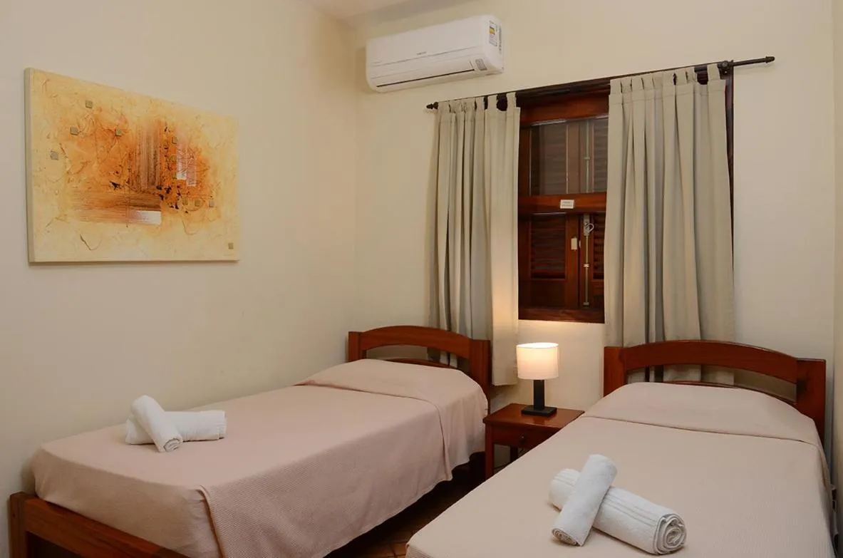 Bed in Pousada Bico Verde