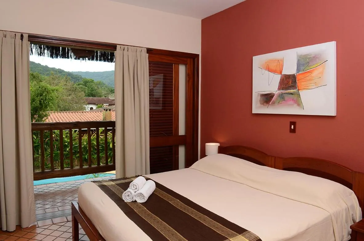 Bed in Pousada Bico Verde