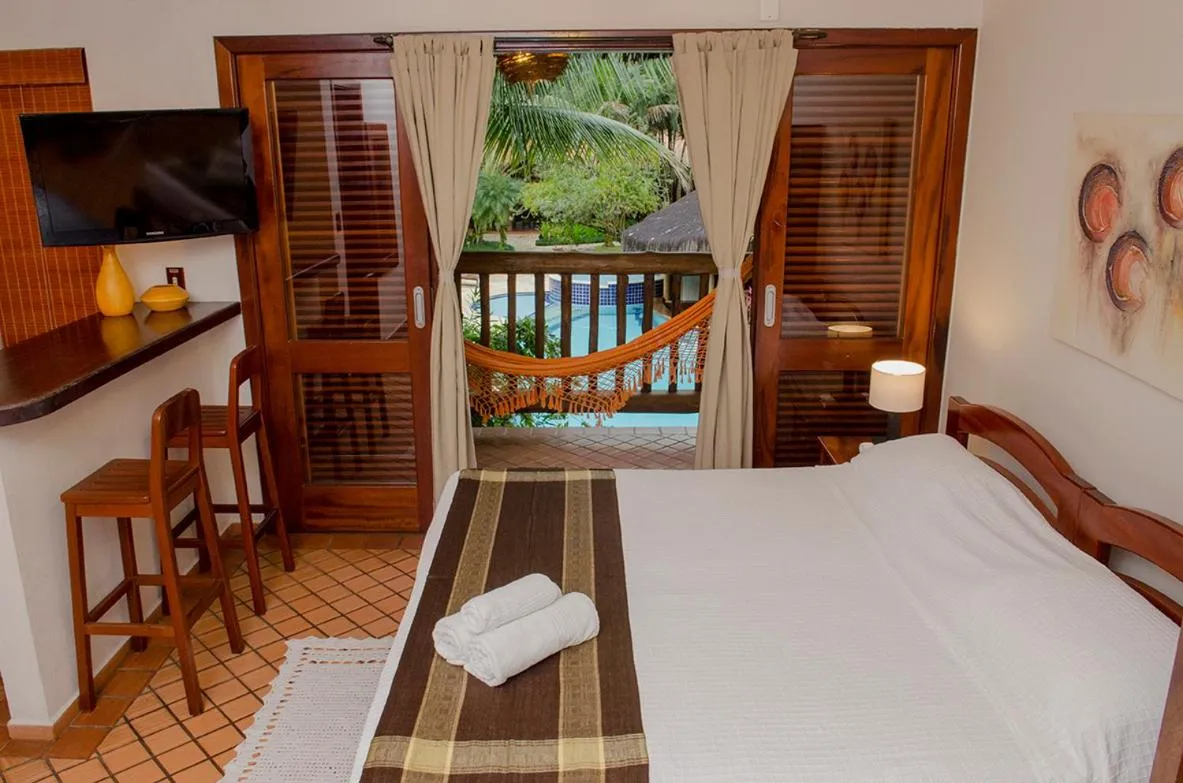 Bed in Pousada Bico Verde