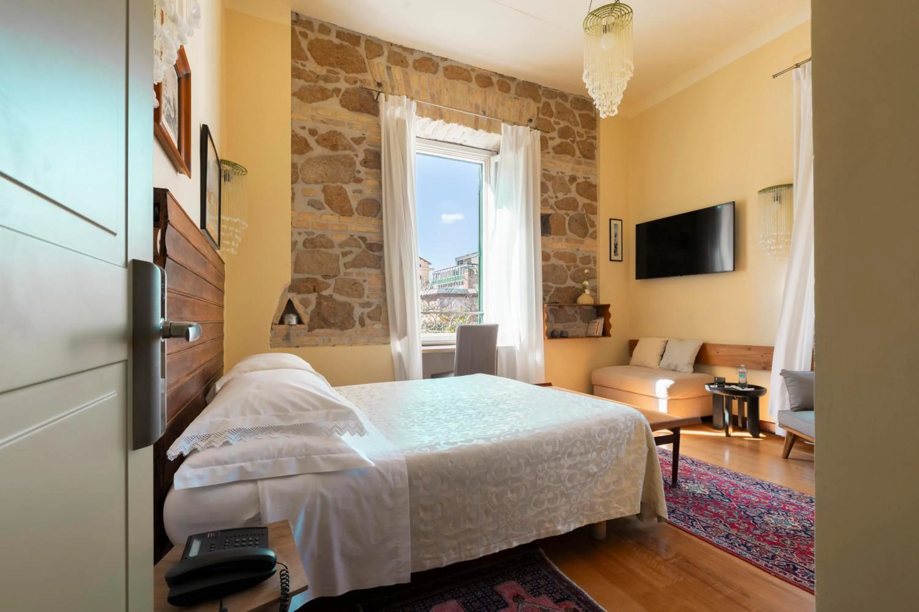 Bed in Palm Gallery Hotel