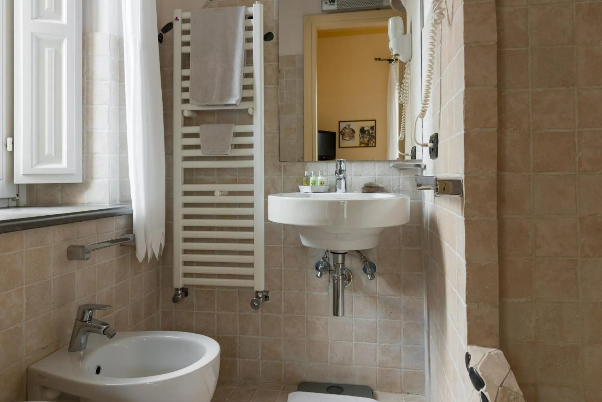 Bathroom in Palm Gallery Hotel