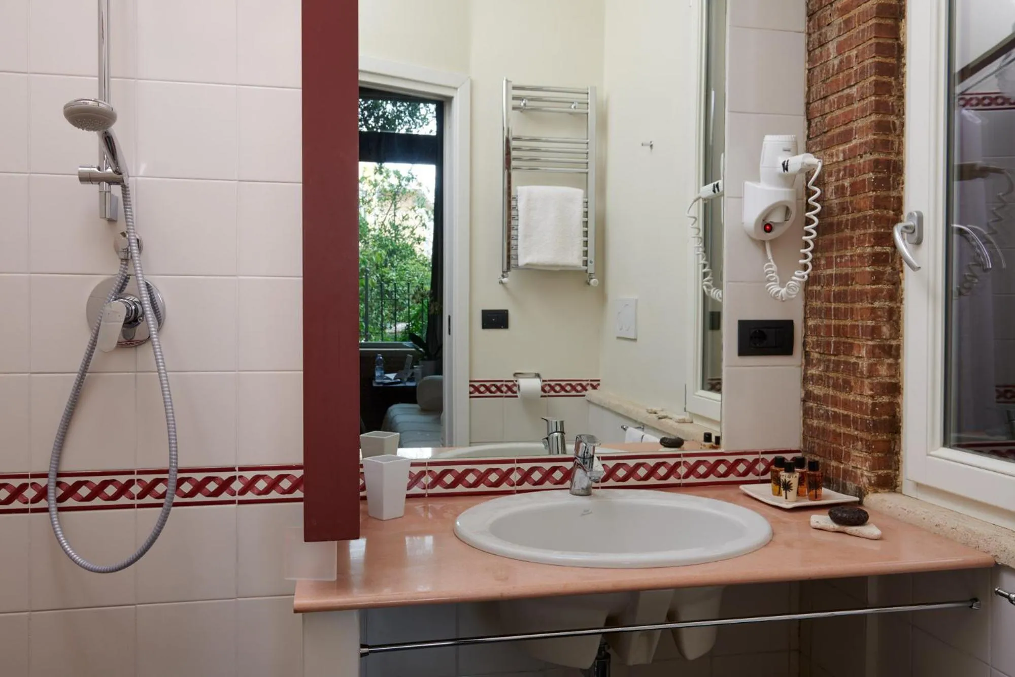 Bathroom in Palm Gallery Hotel