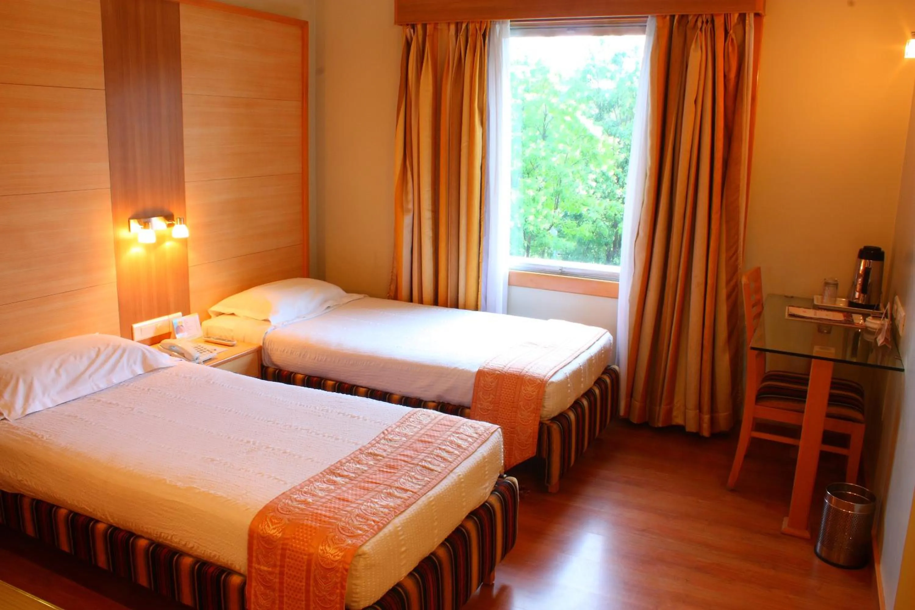 Bedroom, Bed in Ramoji Film City- Tara Comfort Hotel