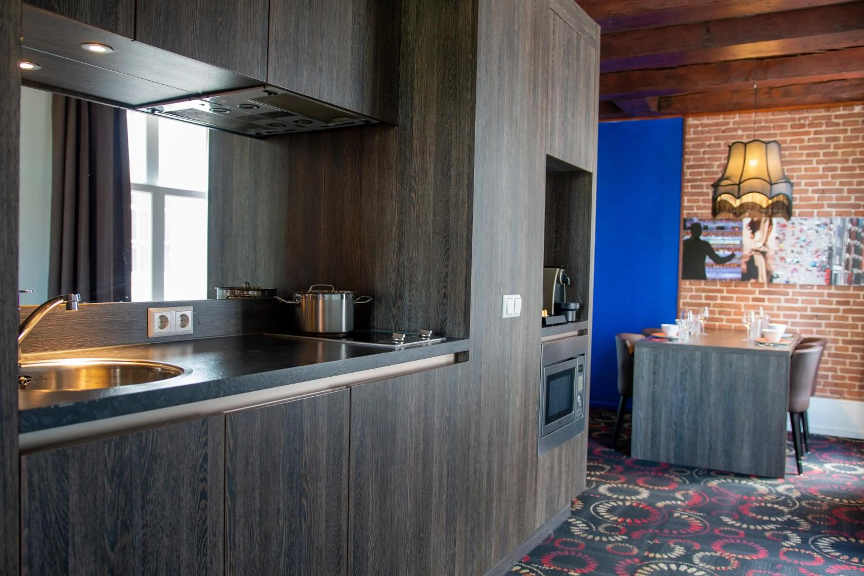 Kitchen or kitchenette in Eden Studios and Apartments