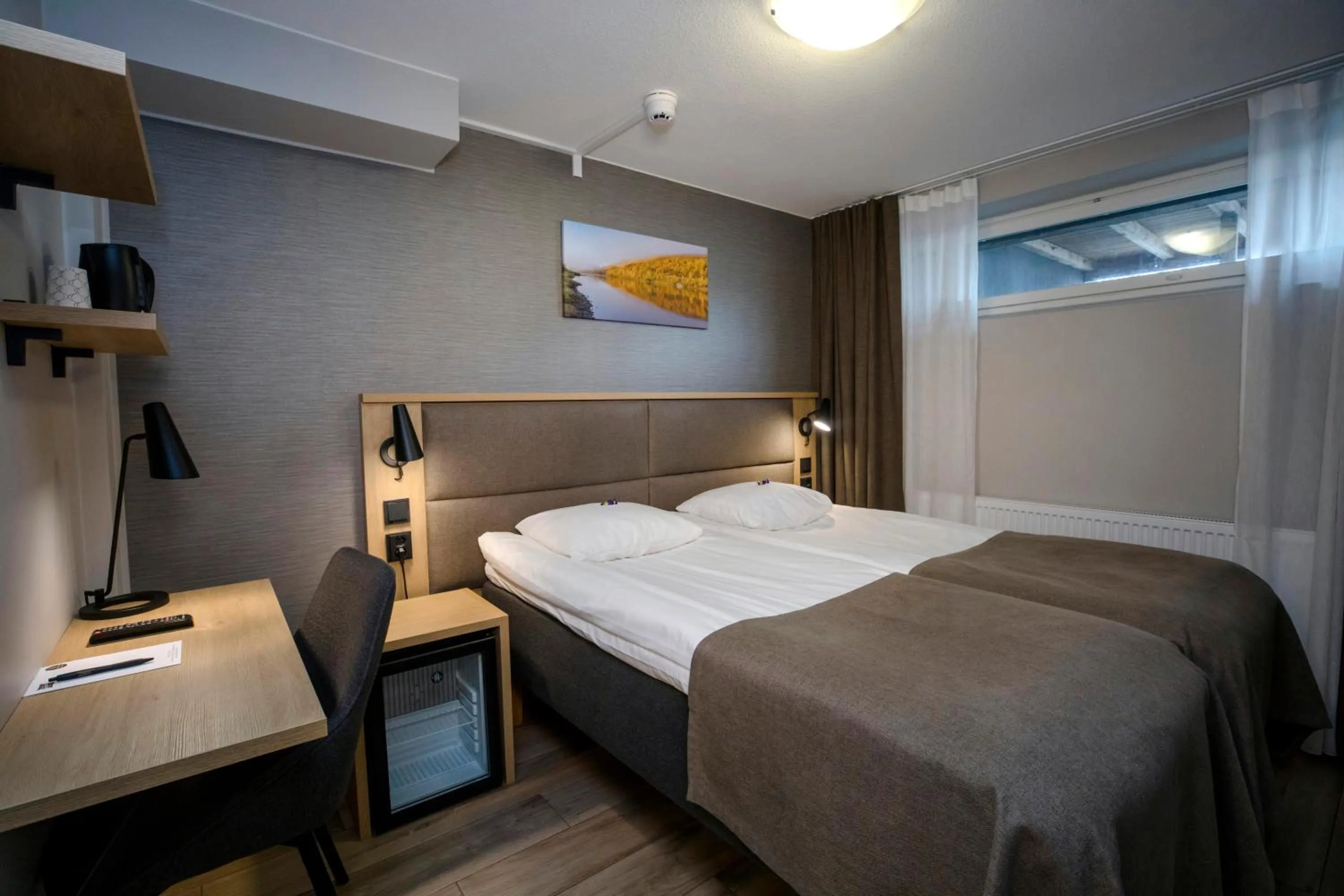 Photo of the whole room, Bed in Hotelli Toivola