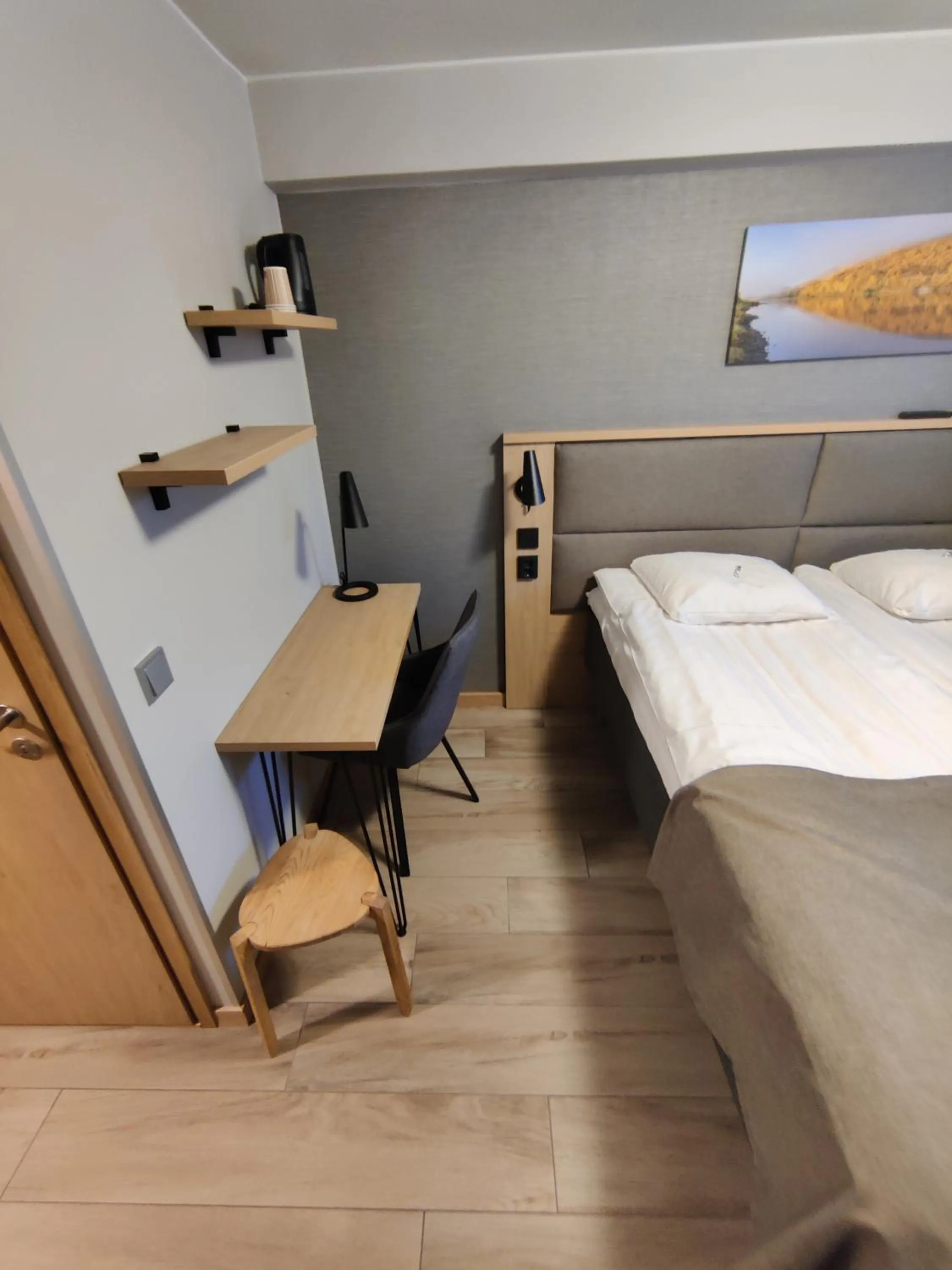 Photo of the whole room, Bed in Hotelli Toivola