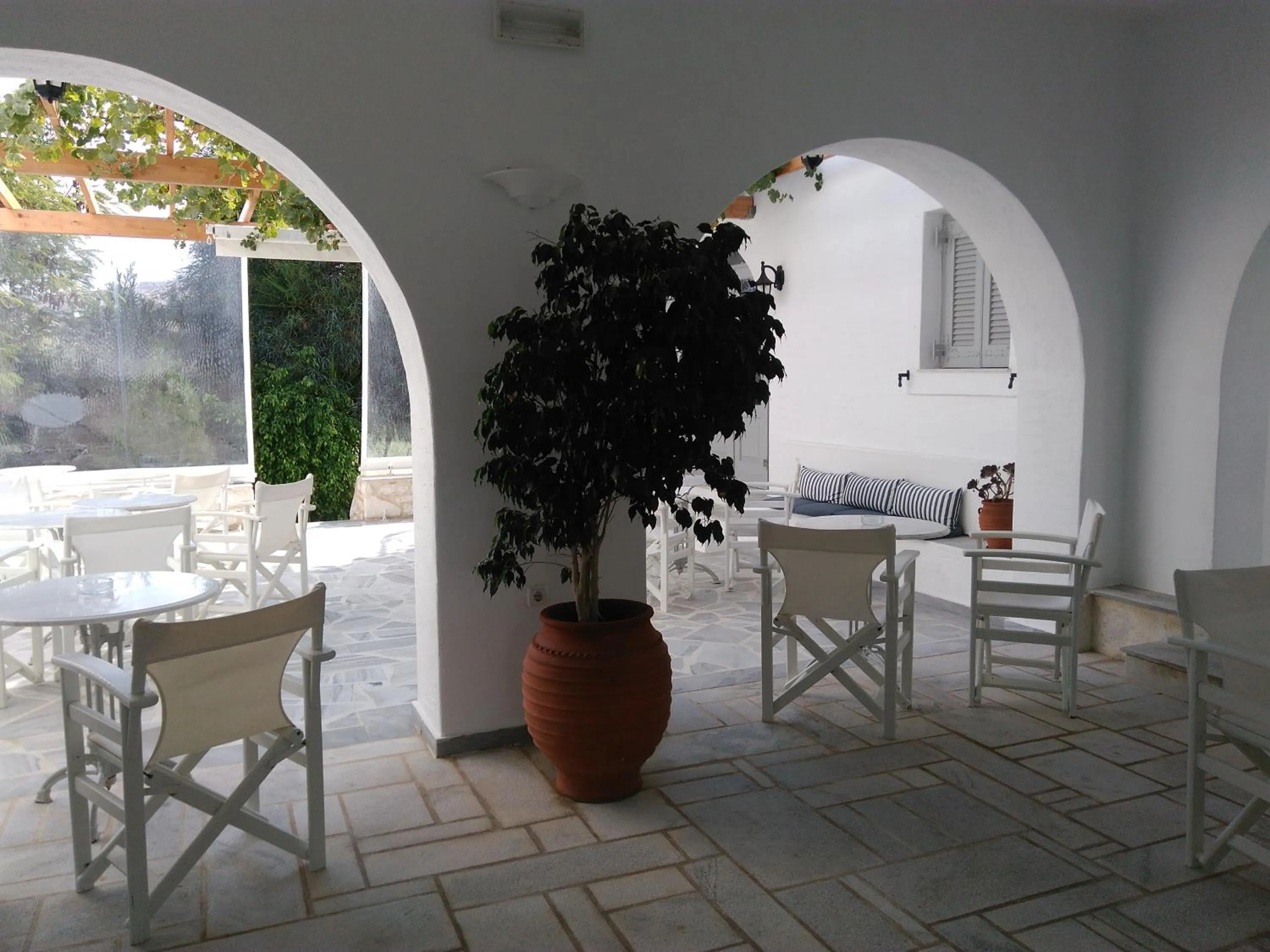 Communal lounge/ TV room in Roussos Beach Hotel