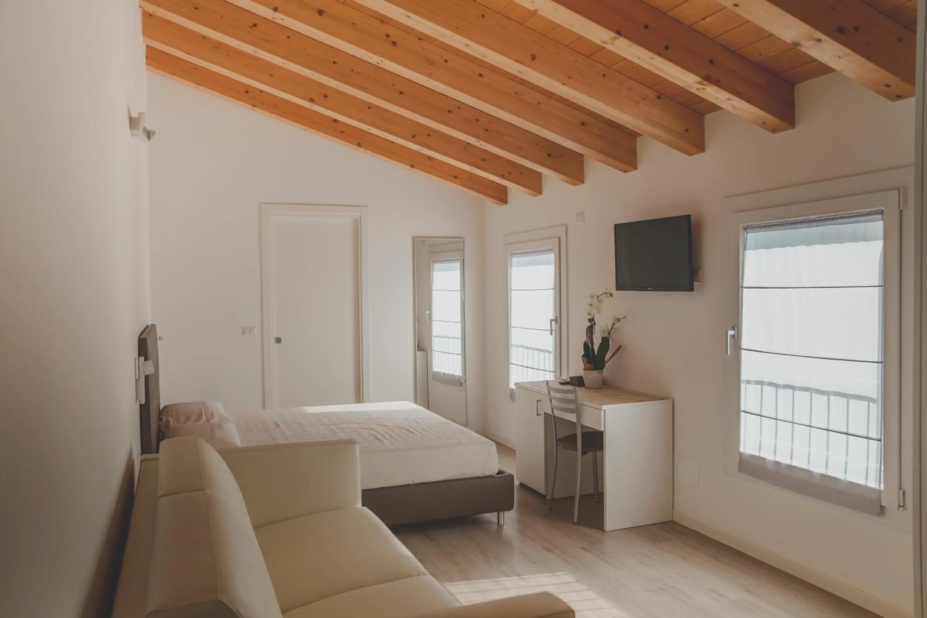 Bed in Terra Ferma Rooms&More