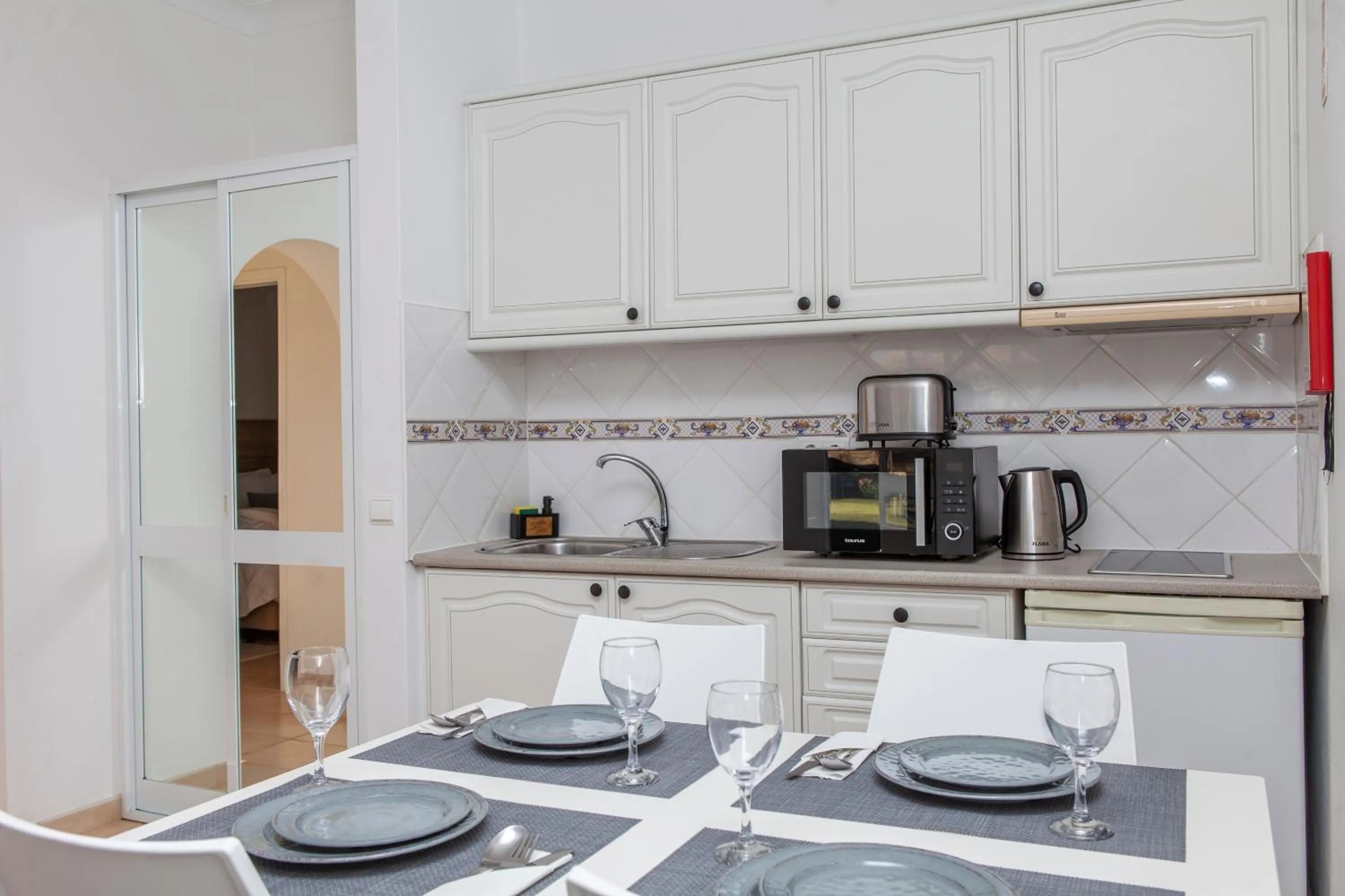 Kitchen or kitchenette in Atalaia Sol Aparthotel - tennis & heated pool in winter