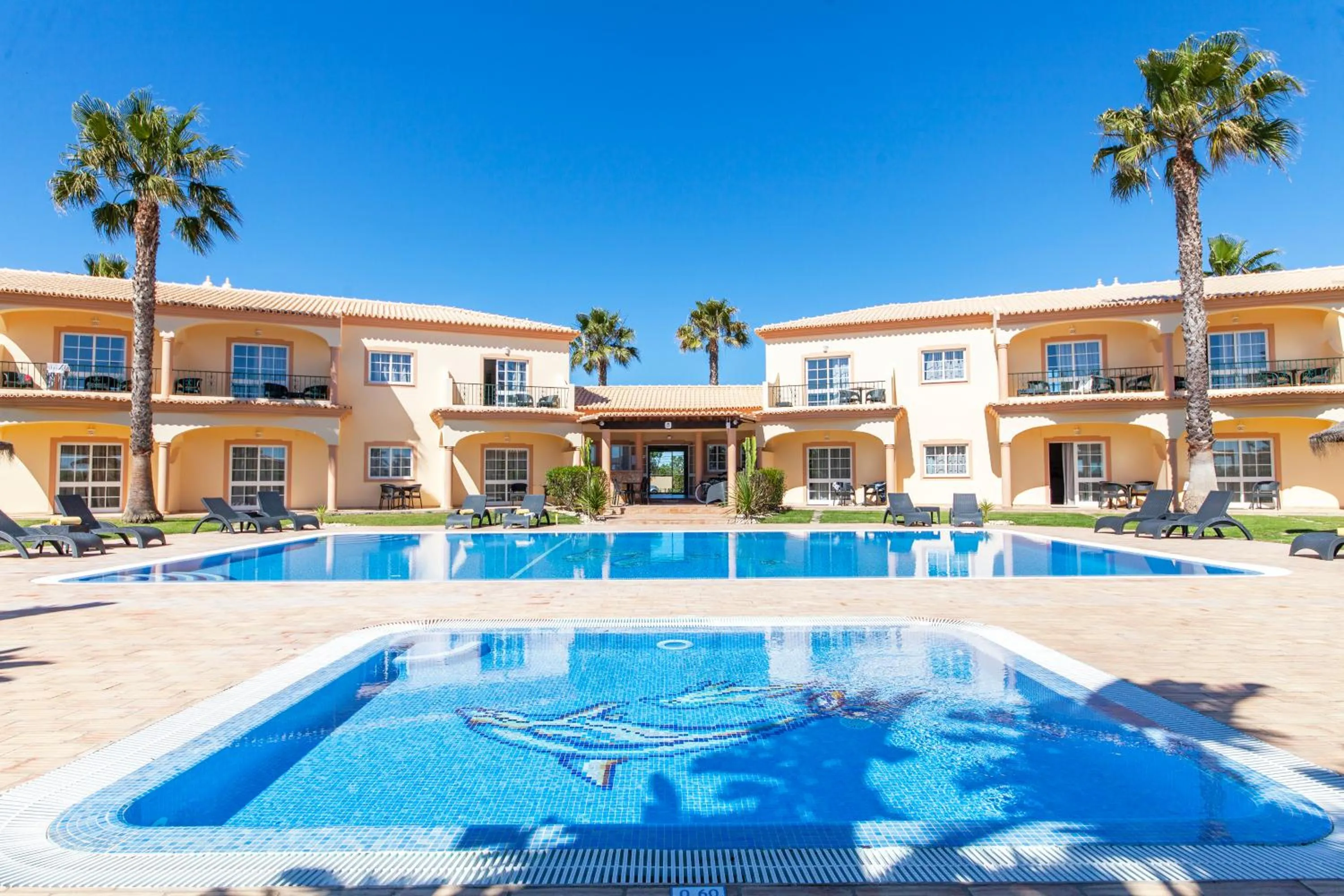 Swimming pool in Atalaia Sol Aparthotel - tennis & heated pool in winter