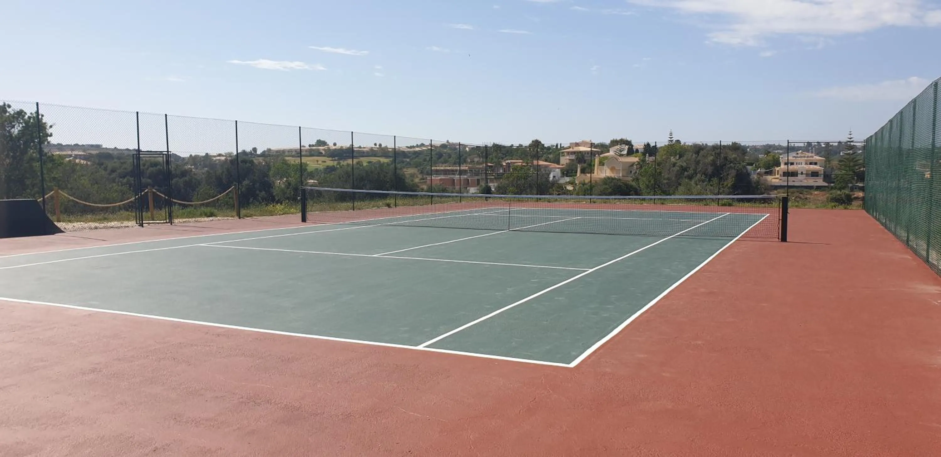 Tennis court in Atalaia Sol Aparthotel - tennis & heated pool in winter