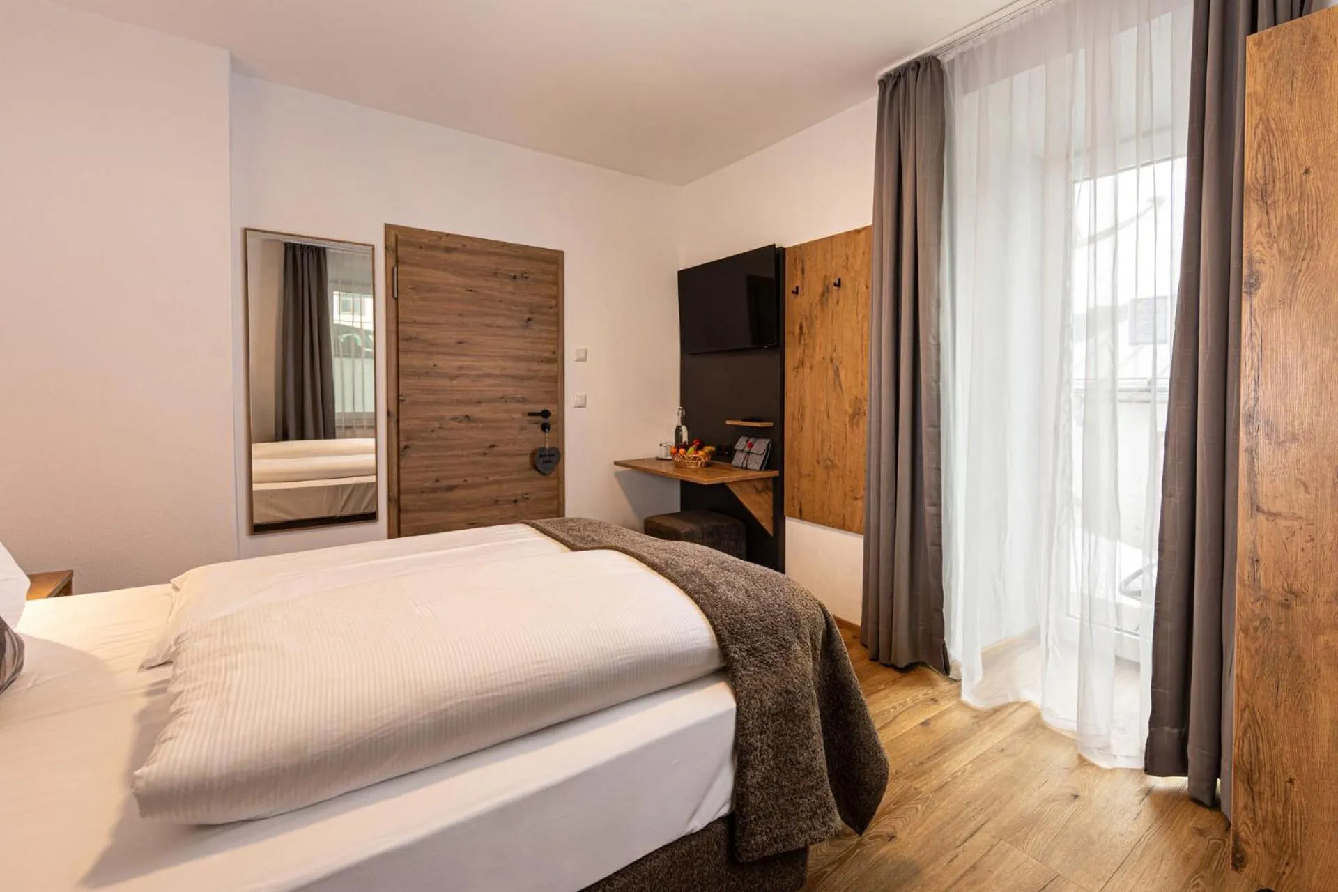 Bed in Hotel AlpinaRos