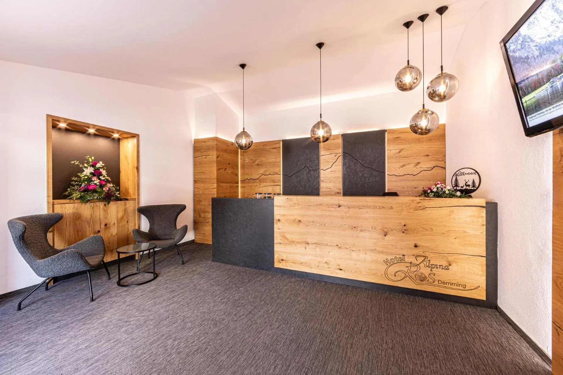 Lobby or reception in Hotel AlpinaRos