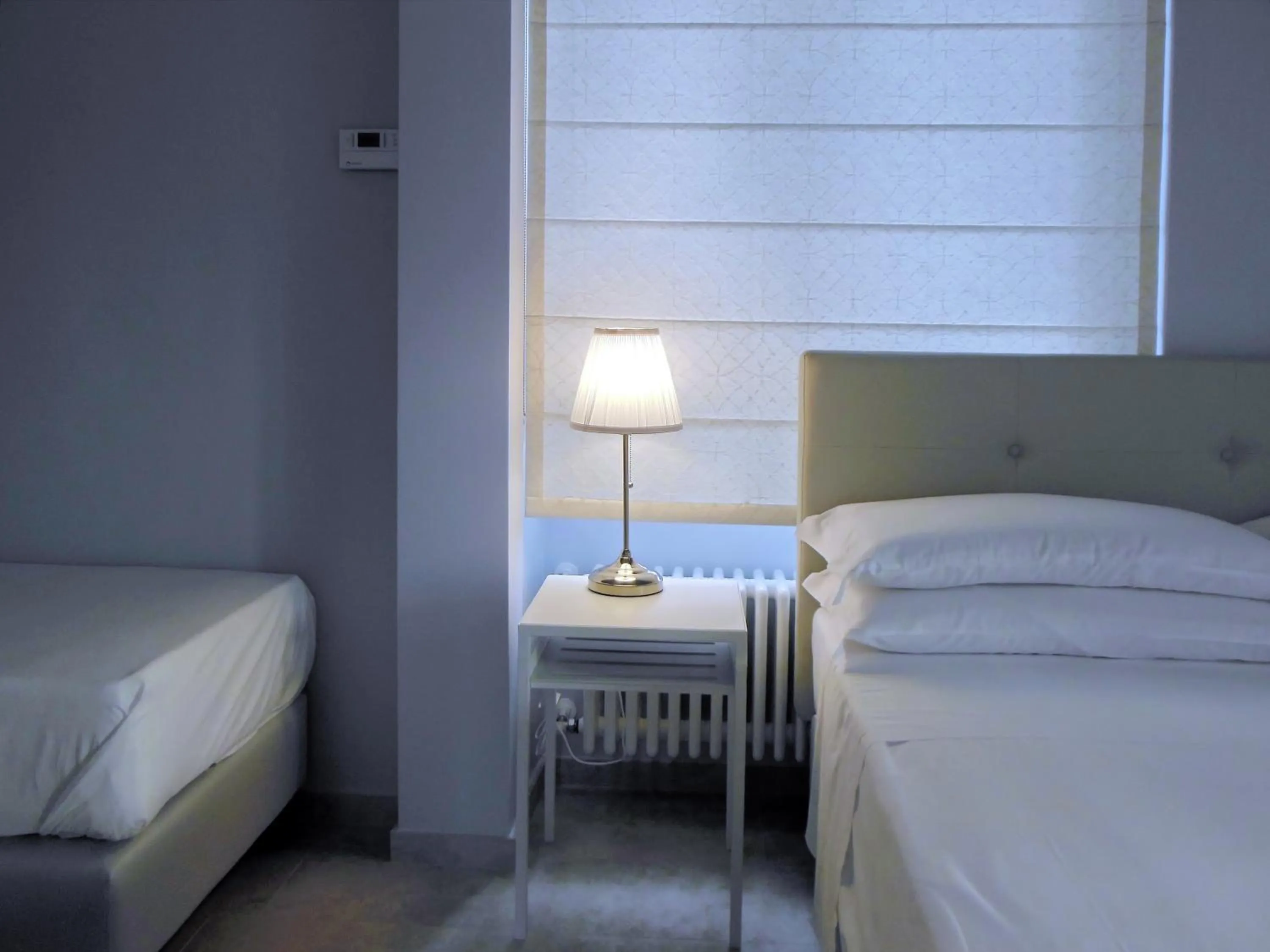 Photo of the whole room, Bed in L'OSPITE - LIFESTYLE RESIDENCE, Design Rooms