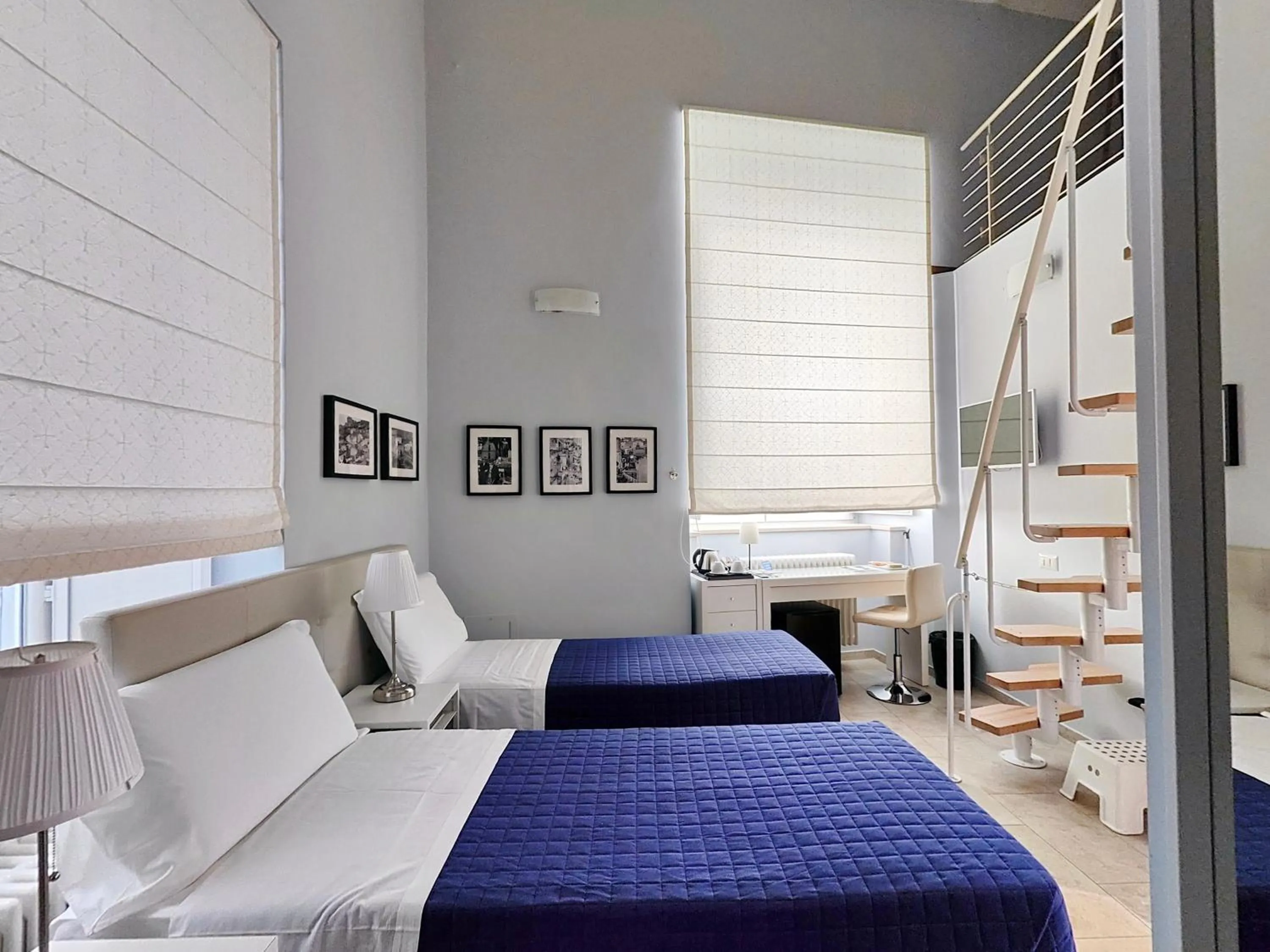 Bed in L'OSPITE - LIFESTYLE RESIDENCE, Design Rooms