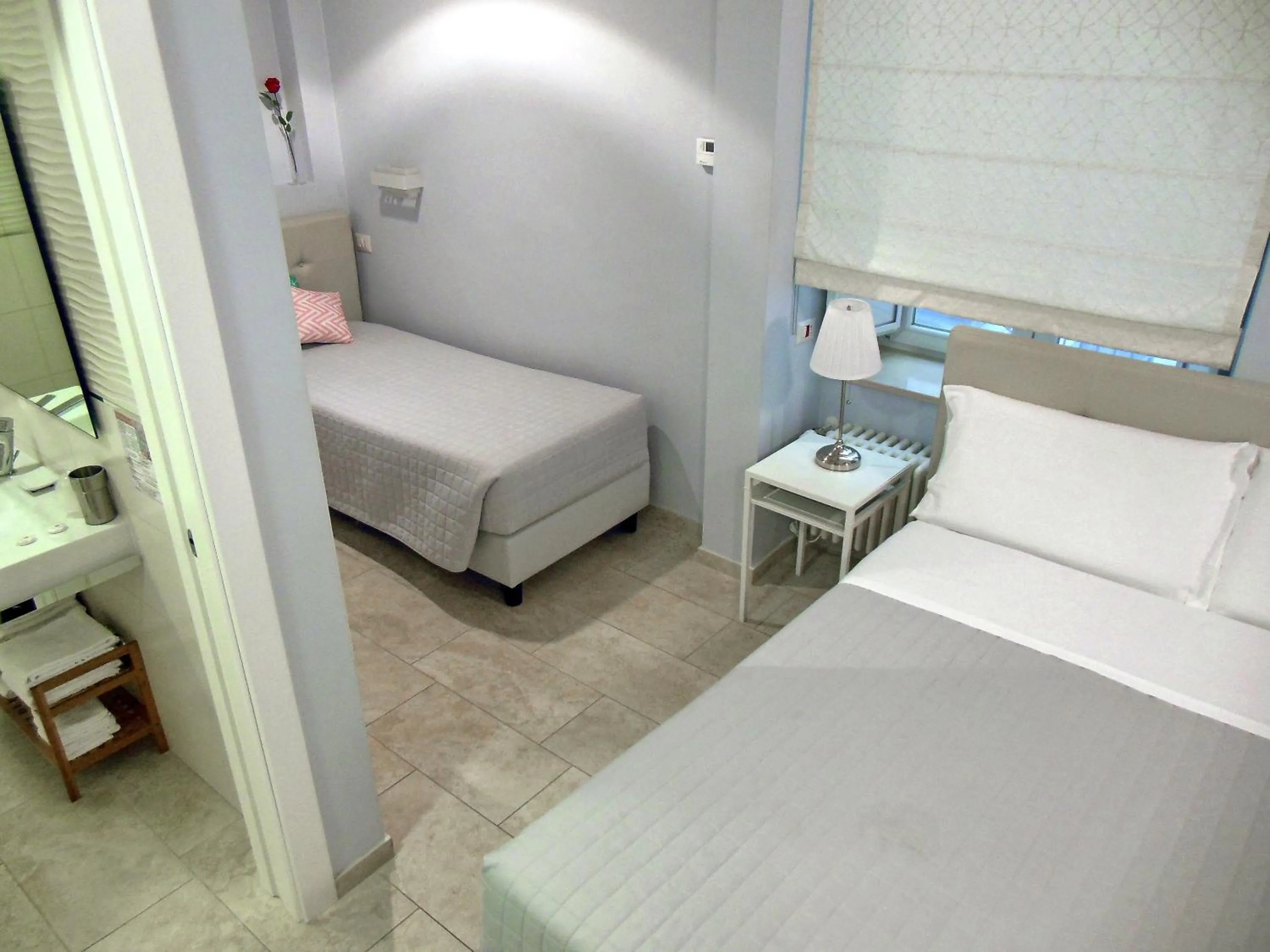 Photo of the whole room, Bed in L'OSPITE - LIFESTYLE RESIDENCE, Design Rooms