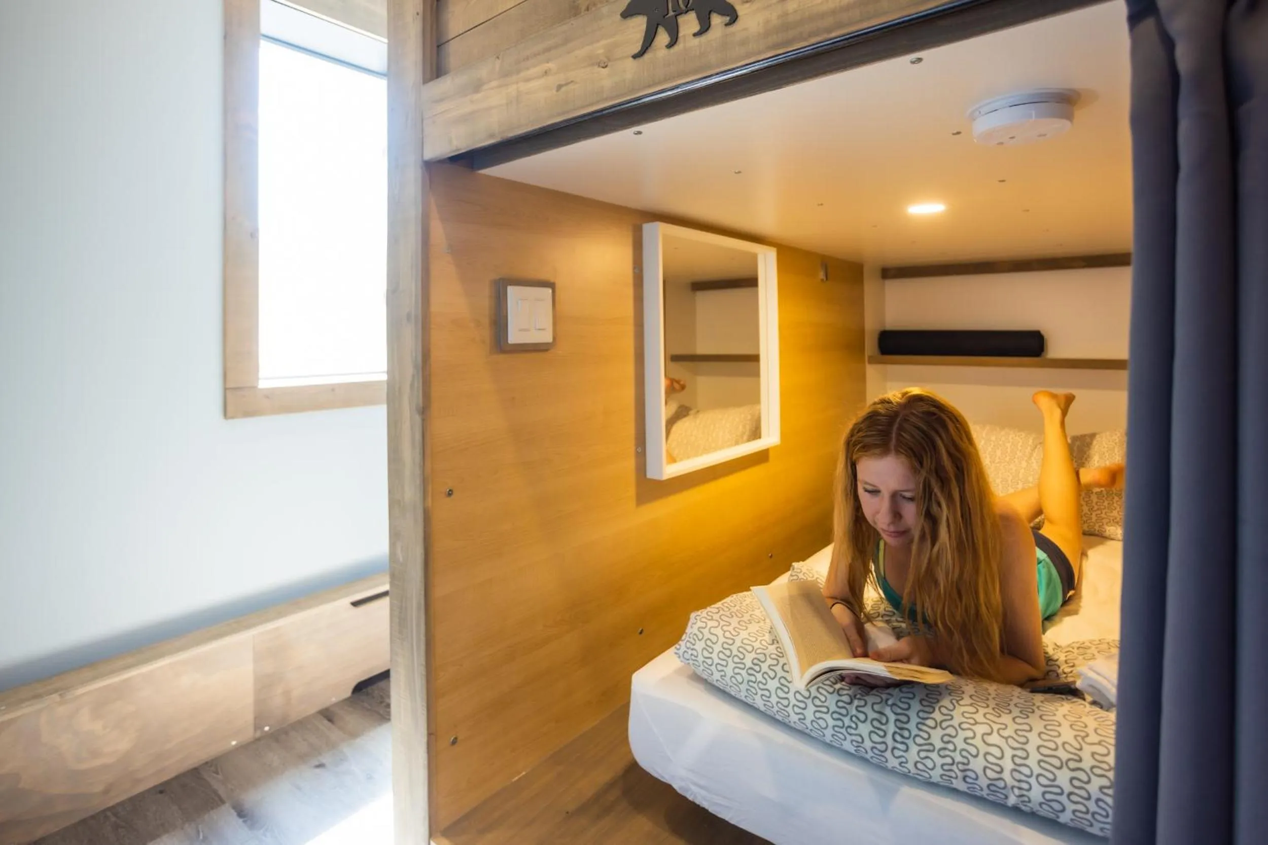 Bed in The Raging Elk Adventure Lodging