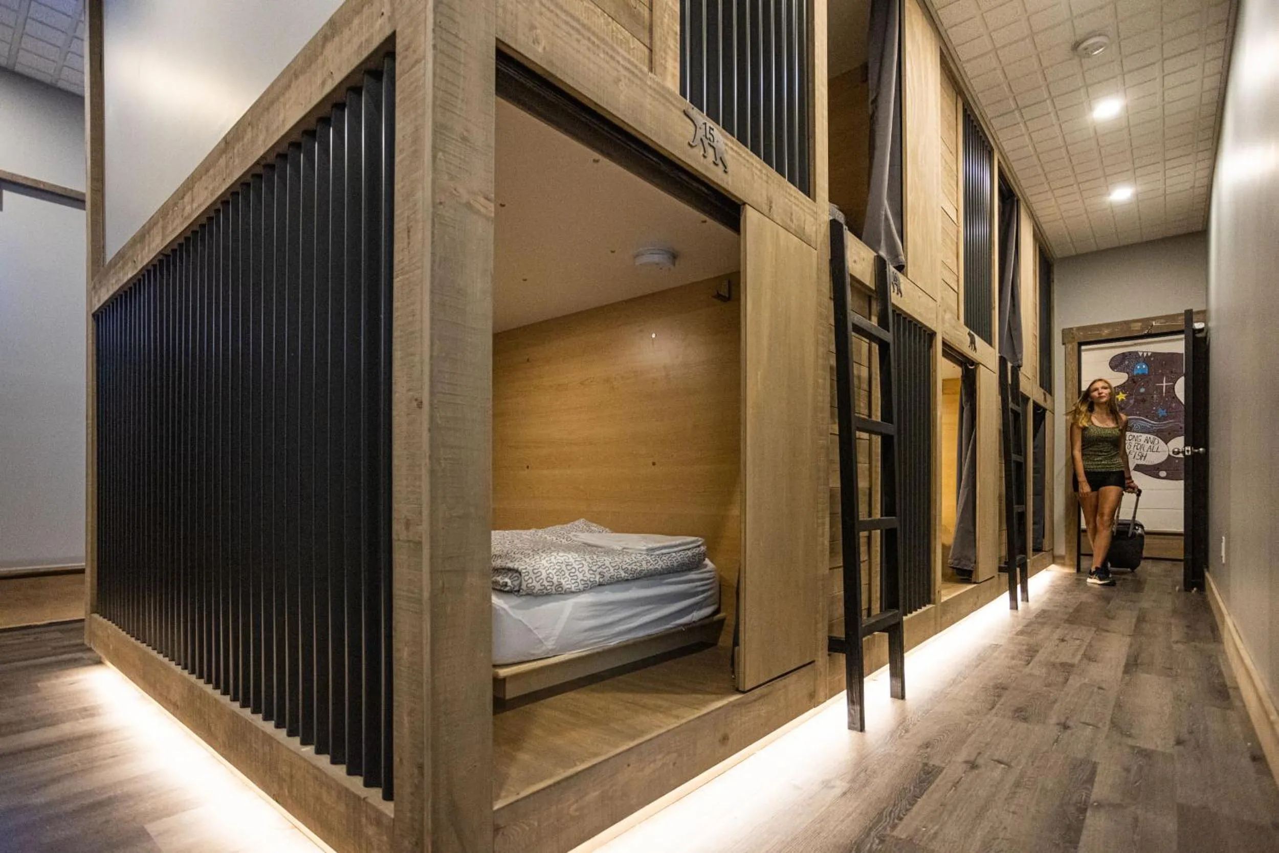 Bed in The Raging Elk Adventure Lodging