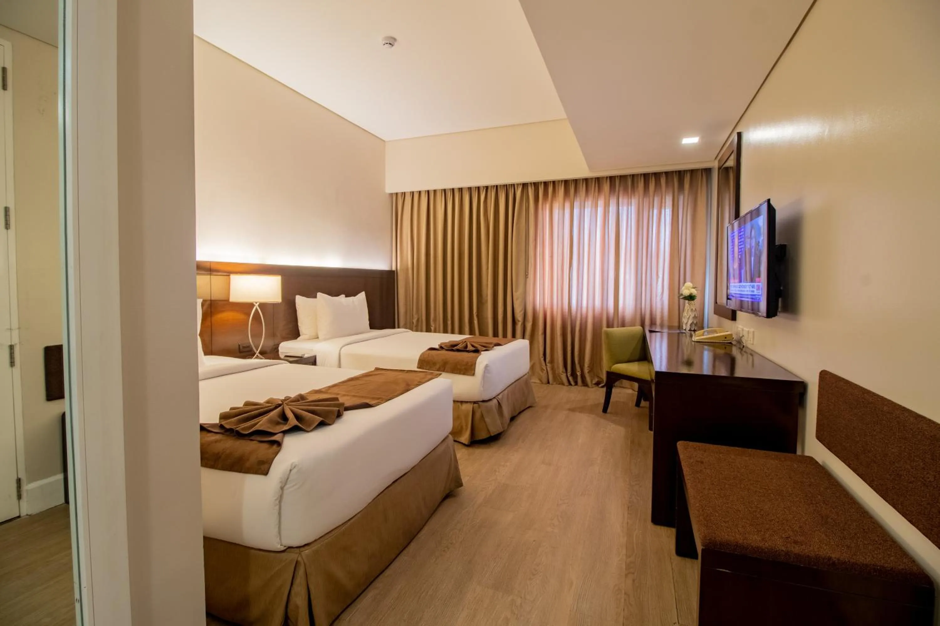 Bed in Harolds Hotel Cebu