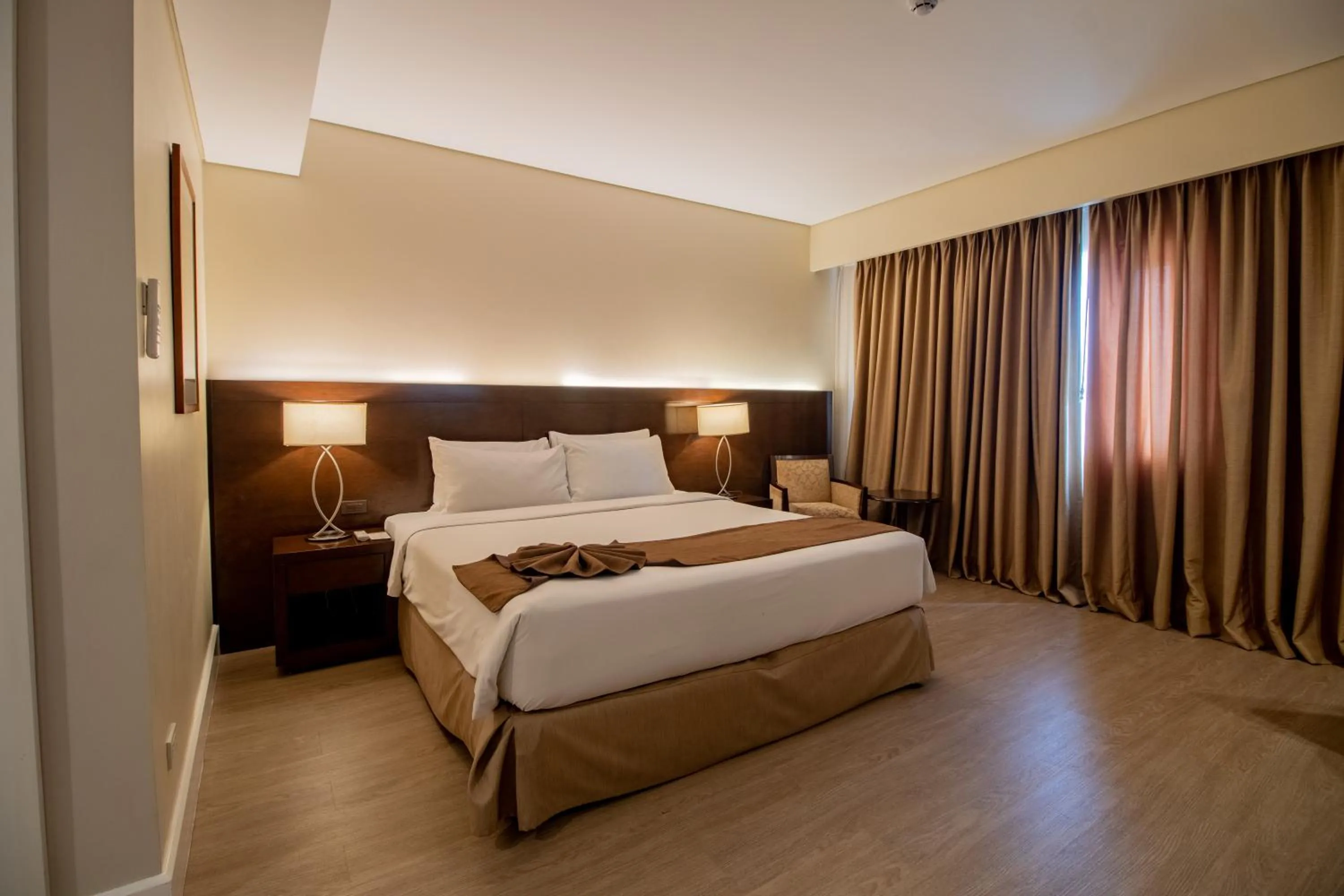 Bed in Harolds Hotel Cebu