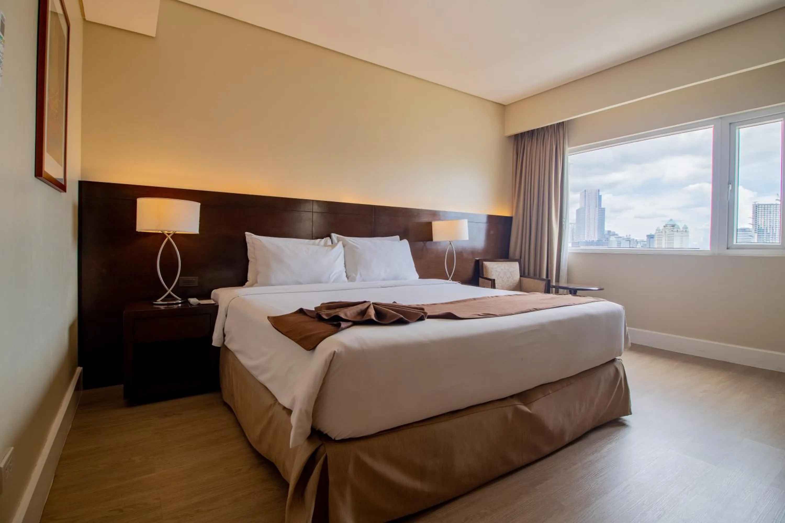 Bed in Harolds Hotel Cebu